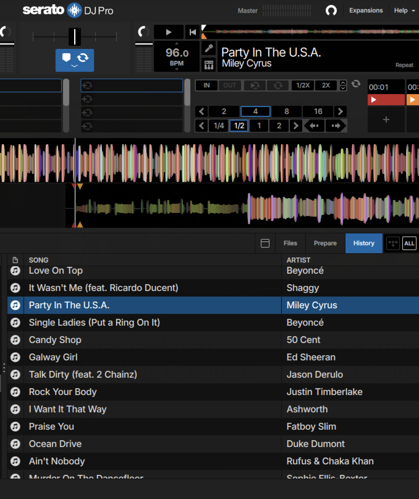 Screenshot of DJ software serato DJ Pro displaying a playlist featuring songs by Beyoncé, Miley Cyrus, Shaggy, 50 Cent, Ed Sheeran, 2 Chainz, Justin Timberlake, Ashworth, Fatboy Slim, Duke Dumont, Rufus & Chaka Khan, and Sophie Ellis-Baxter. The song "Party In The U.S.A." by Miley Cyrus is selected.