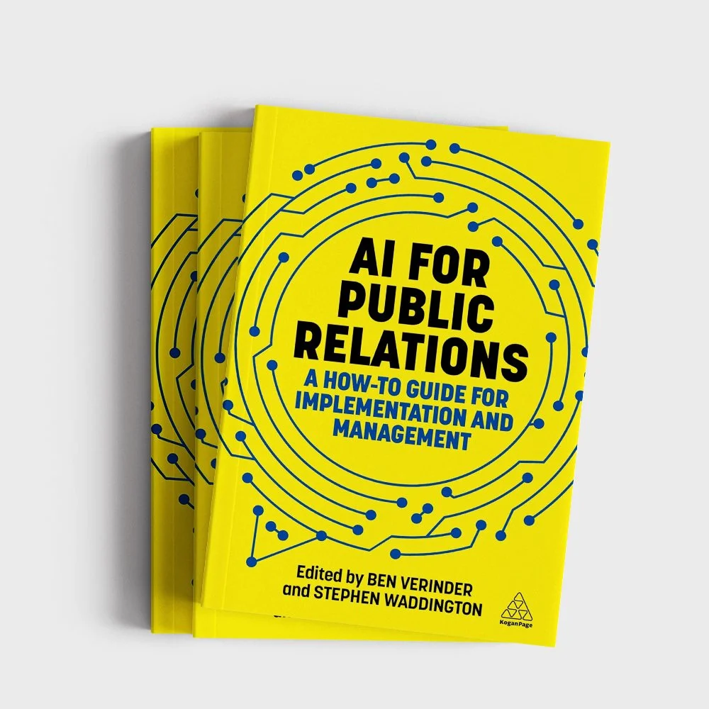 Stack of books titled 'AI for Public Relations: A How-To Guide for Implementation and Management,' edited by Ben Verinder and Stephen Waddington, with a yellow cover featuring a circuit-like design.