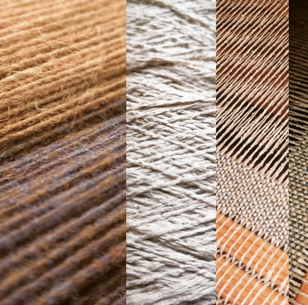 Close-up of different types of yarn or thread in various textures and colors, arranged side by side.