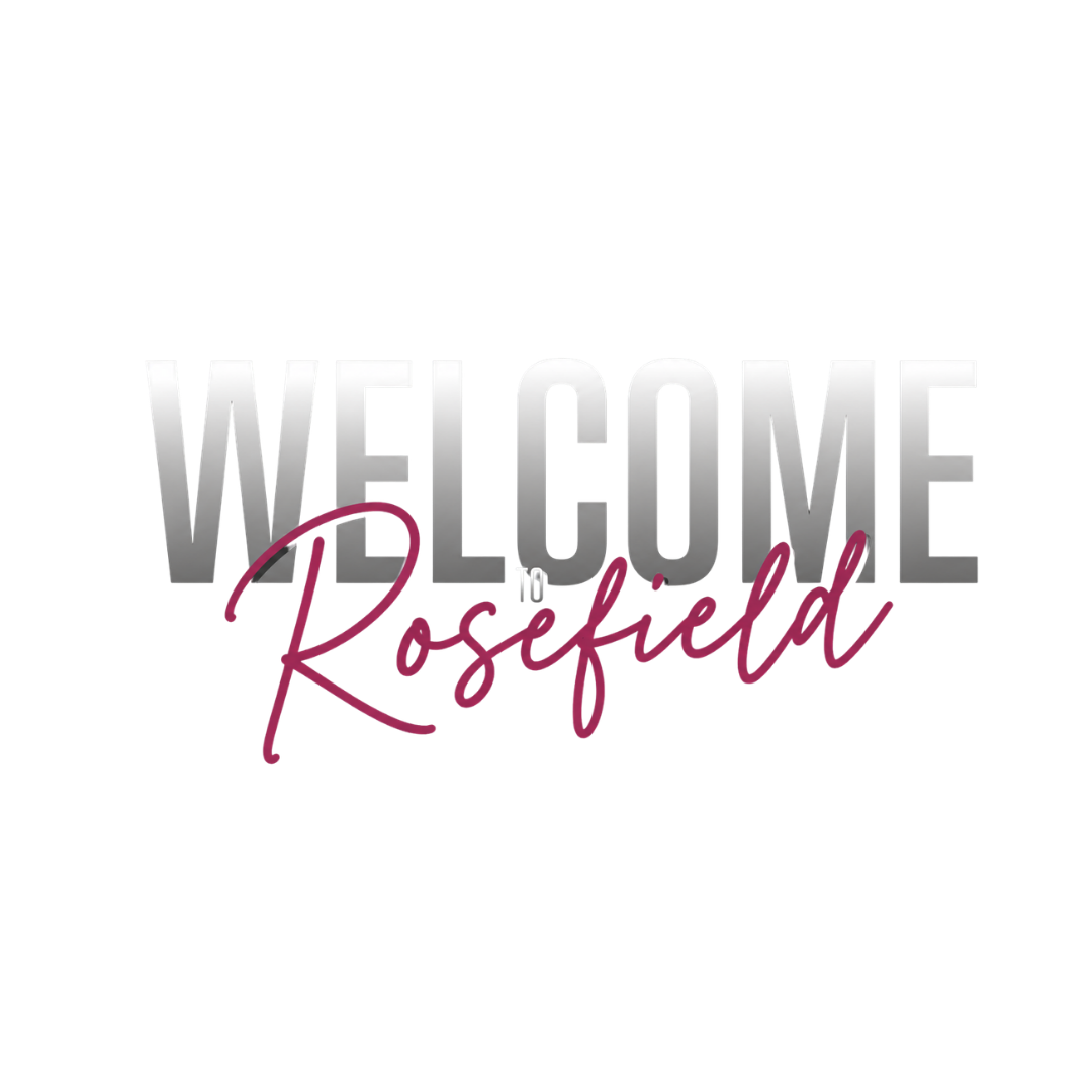 Neon sign saying "Welcome to Roskeida" with "Welcome" in silver letters and "to Roskeida" in pink cursive.