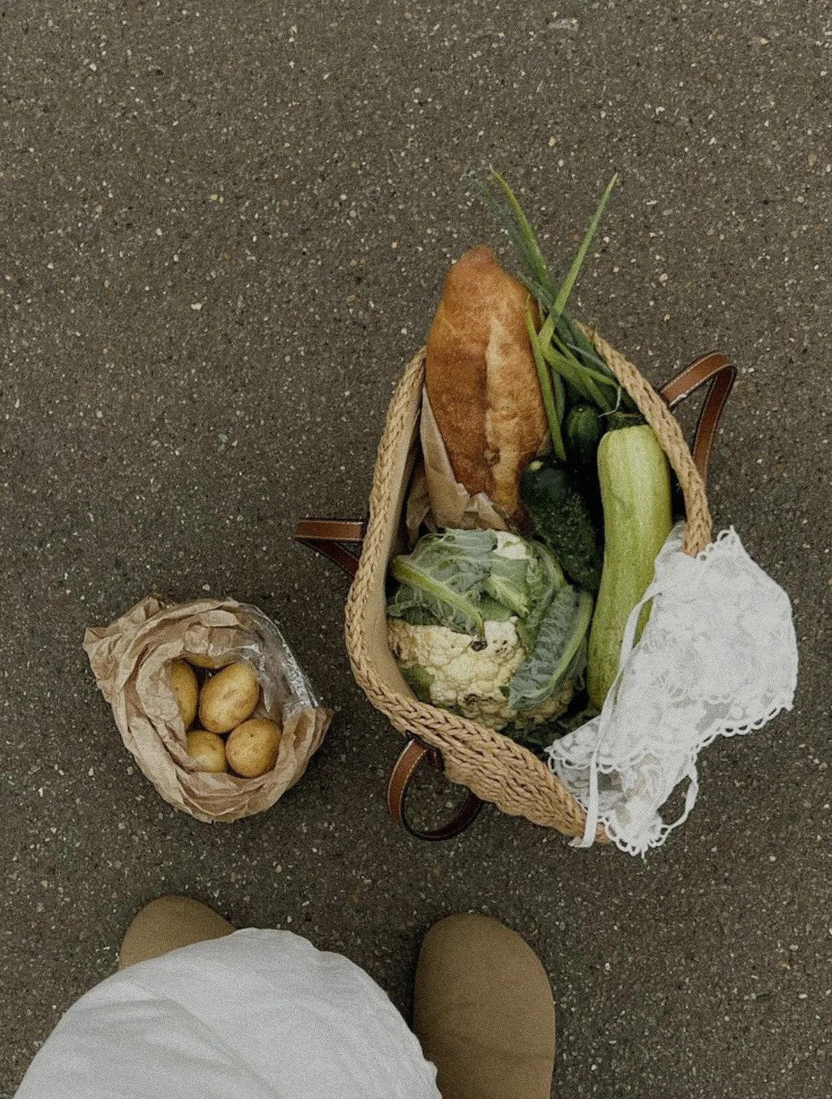 Fresh produce and vegetables in a market basket.
