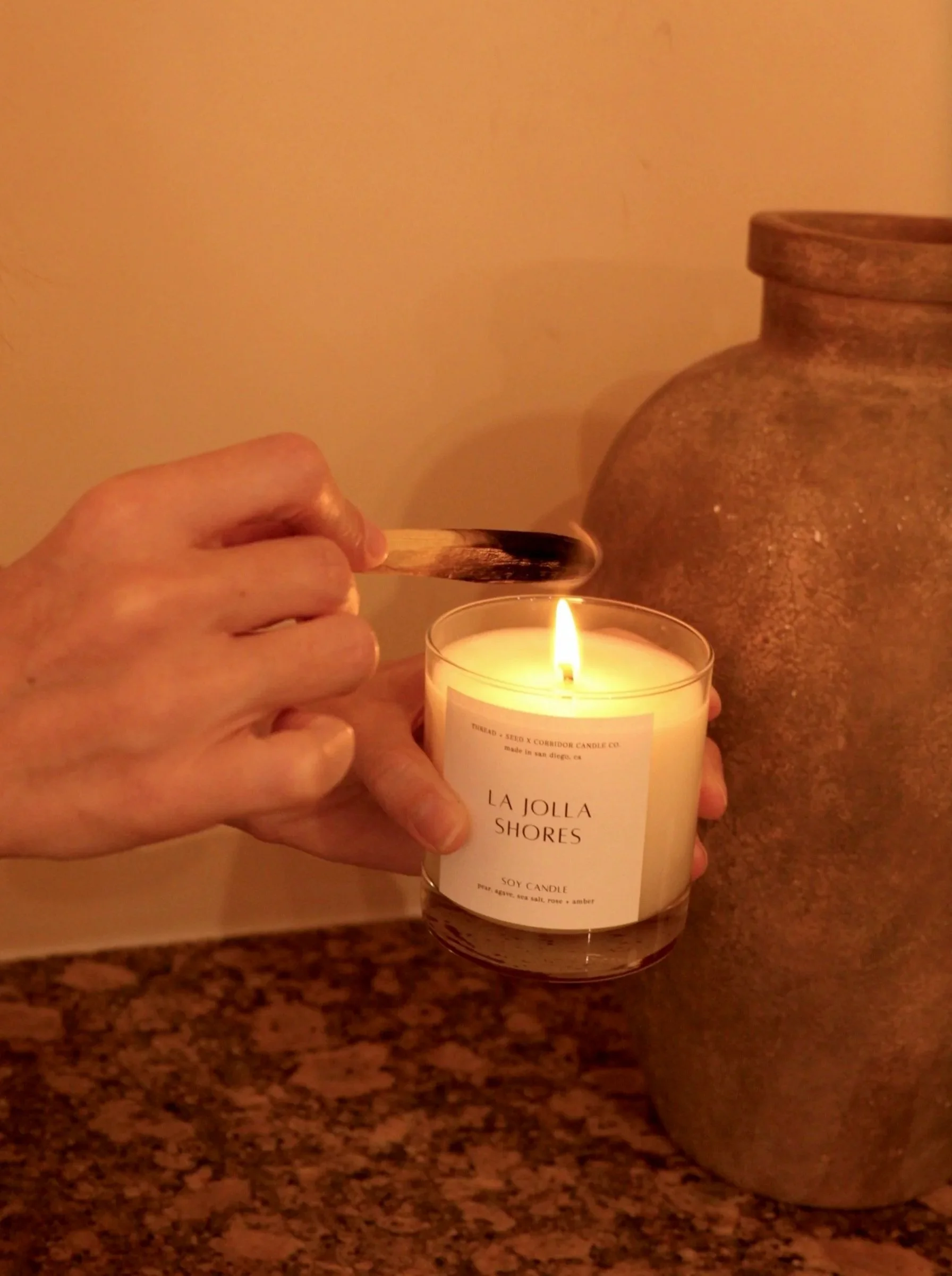 La Jolla Shores candle creating a warm, relaxing atmosphere.