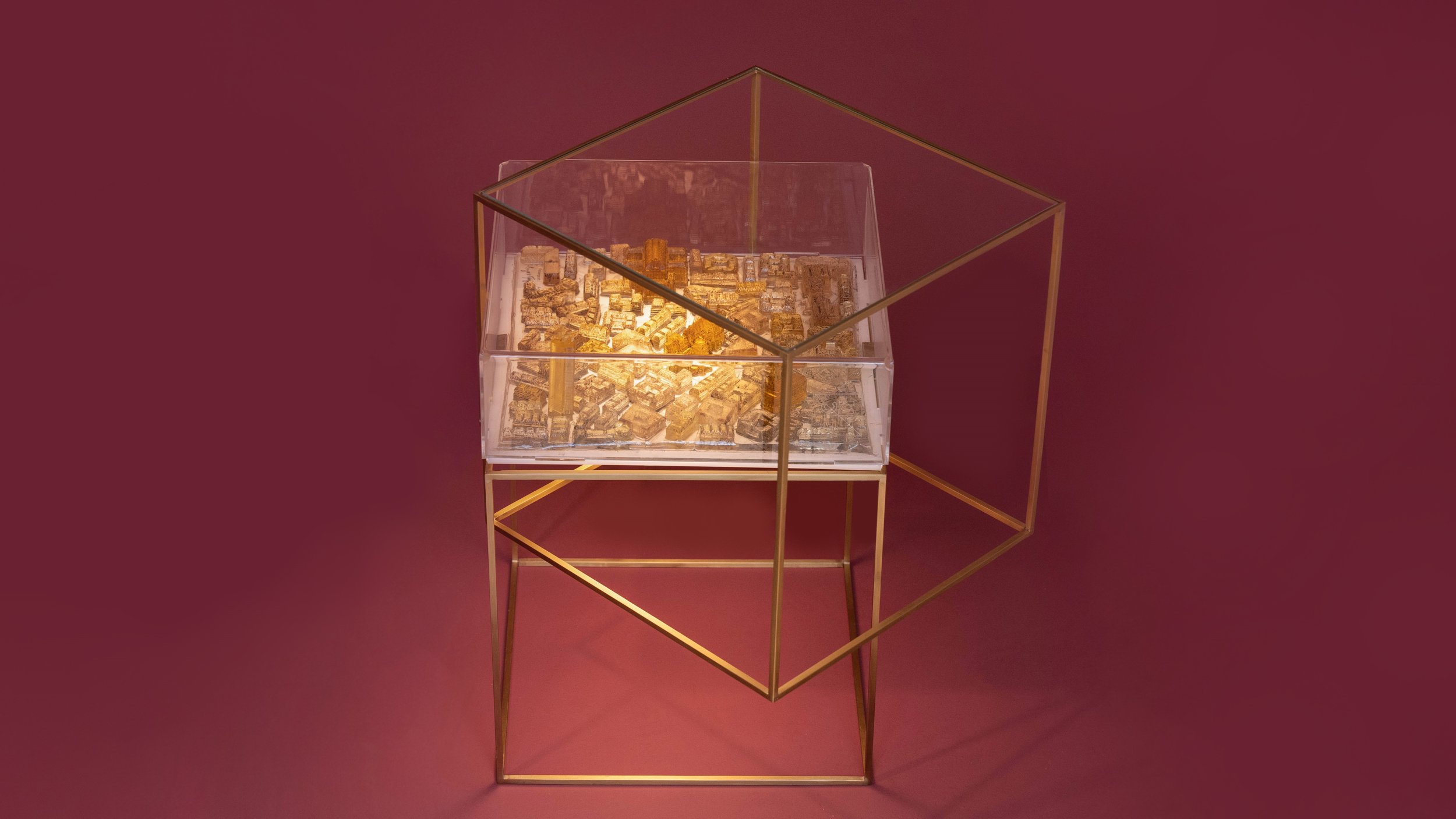 An ICON™ piece of art that stands like a table and a piece of art with light stands out.