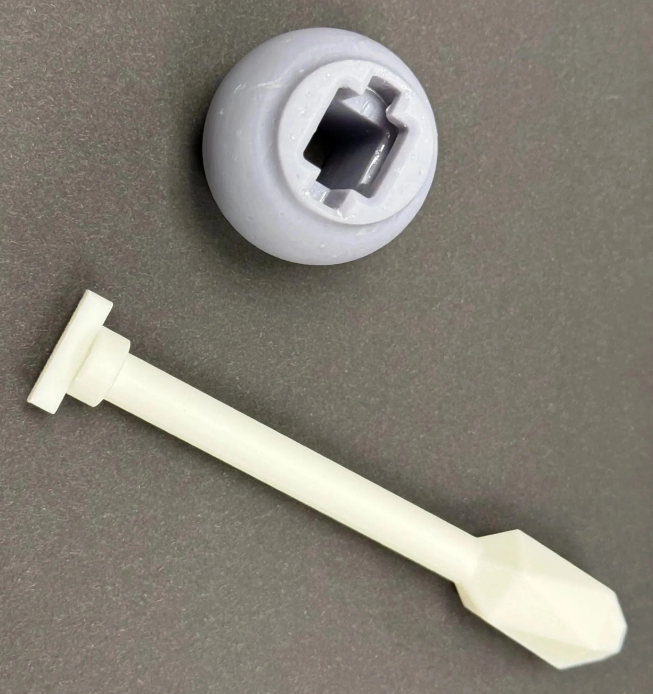 Prototype intraoperative ultrasound applicator developed to improve visualization of brain tumor resection cavities.