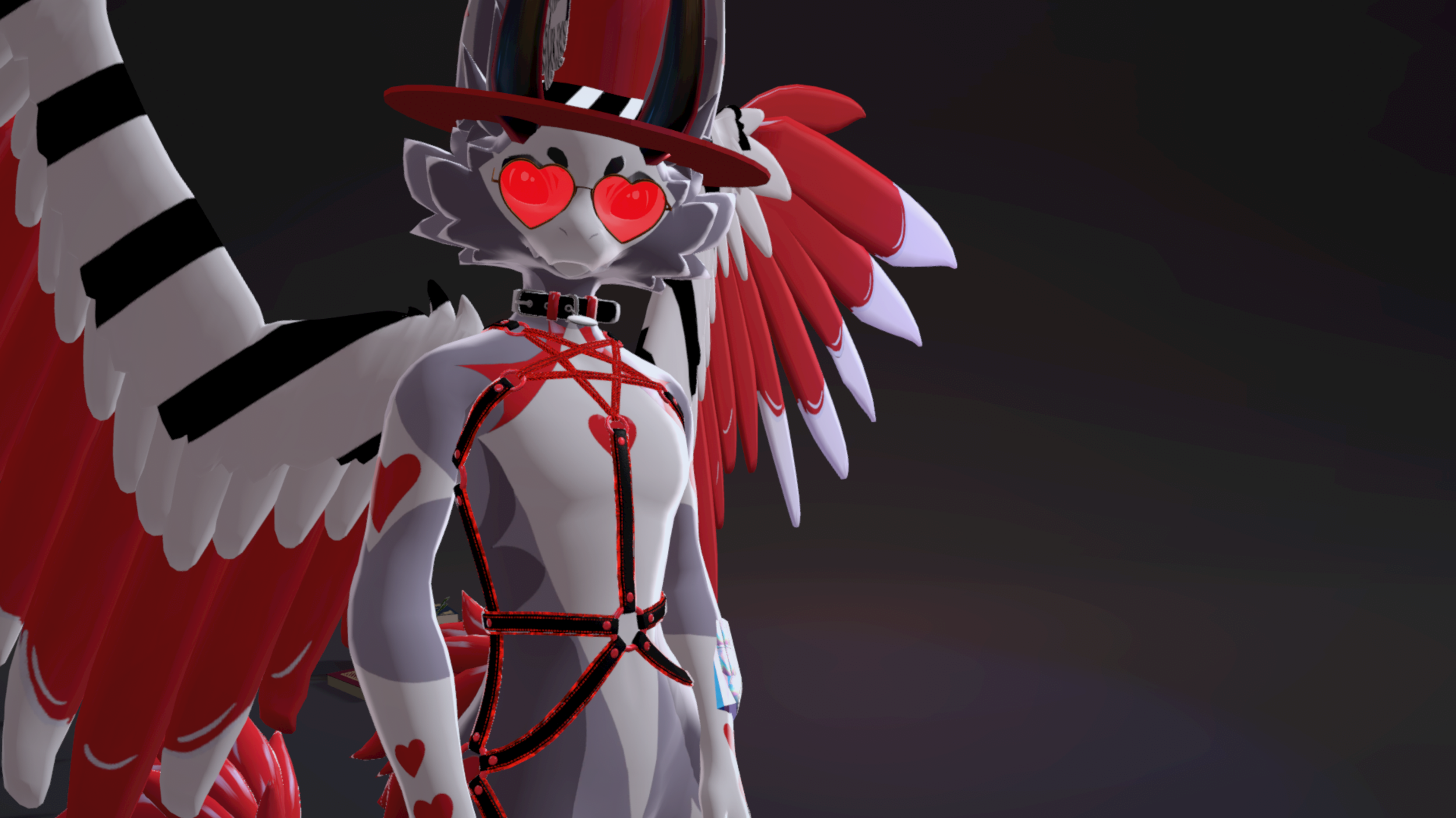 A white anthropomorphic wolf character with red and black heart-themed accessories, wearing a red wide-brimmed hat, glasses with red heart-shaped lenses, and red and white wings, set against a dark background.
