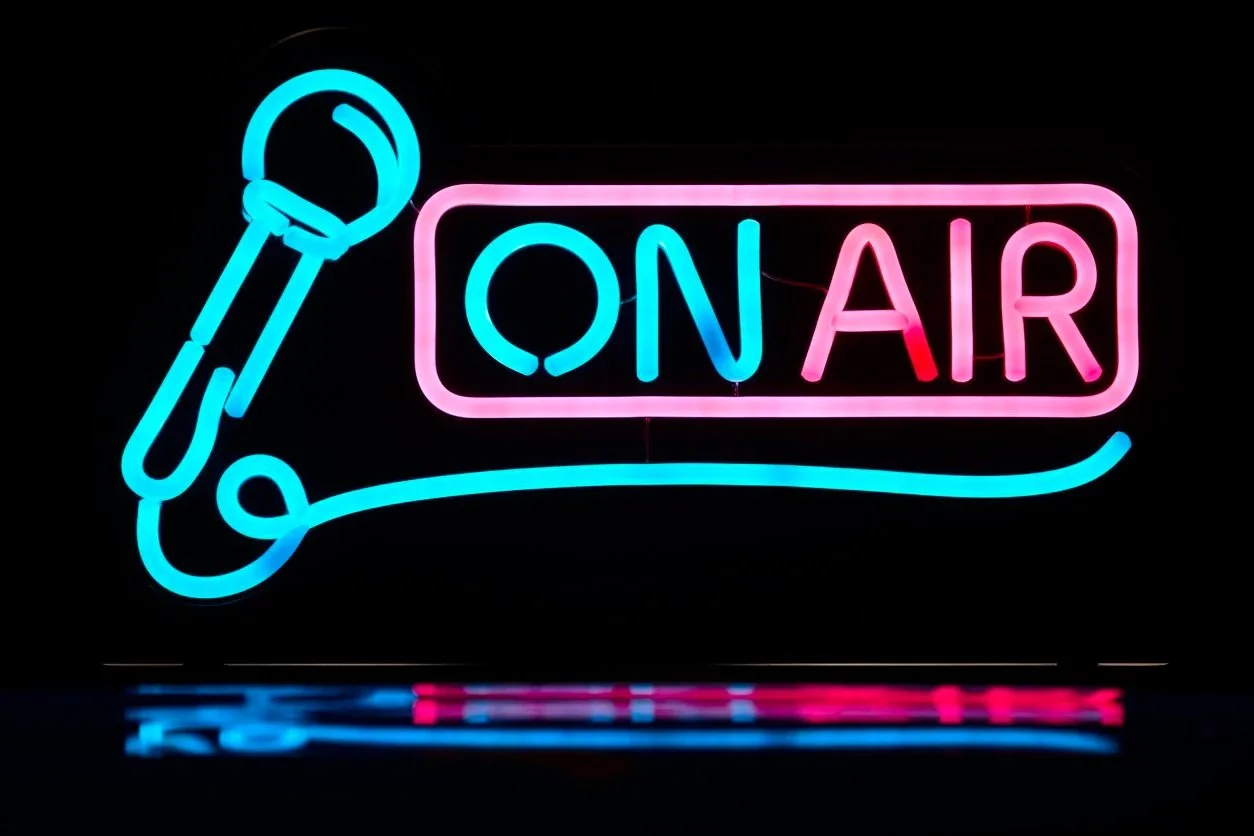 Neon sign with the words "on air"
