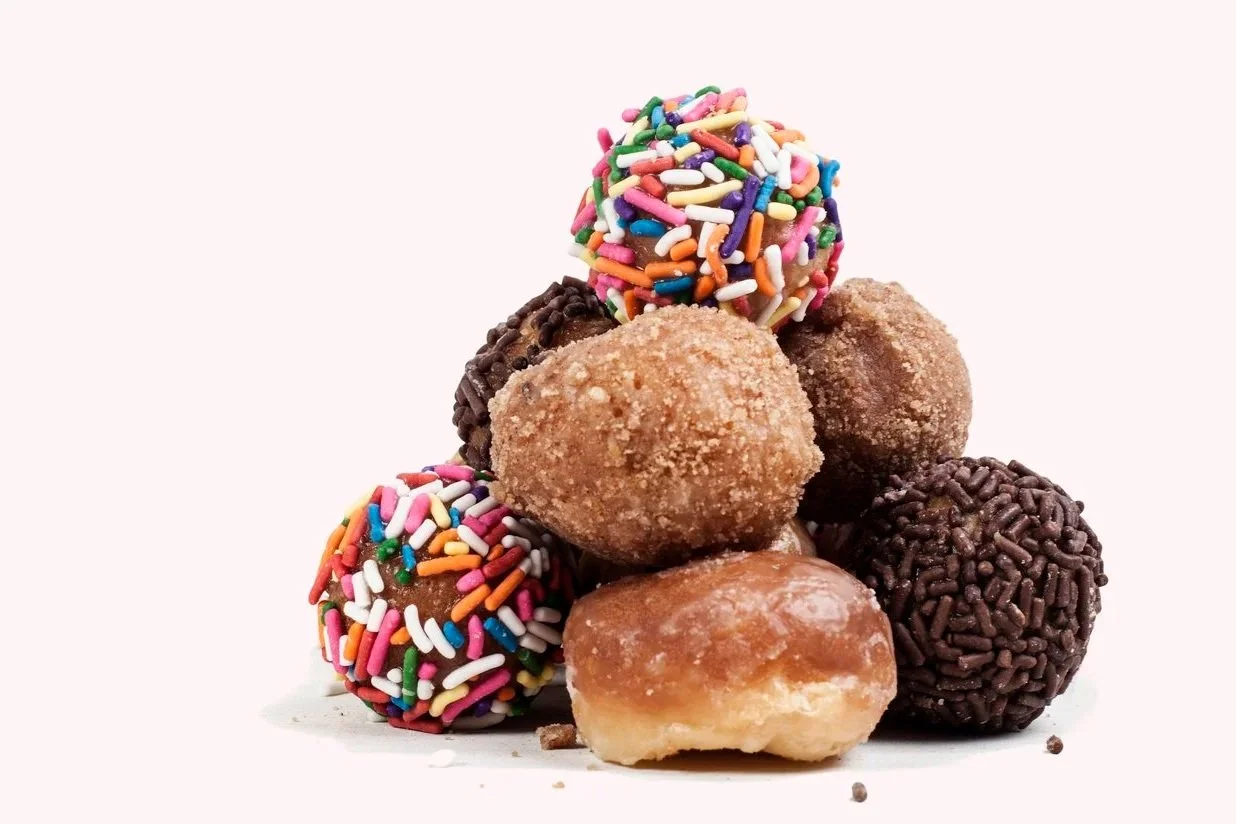 variety of donut holes stacked up
