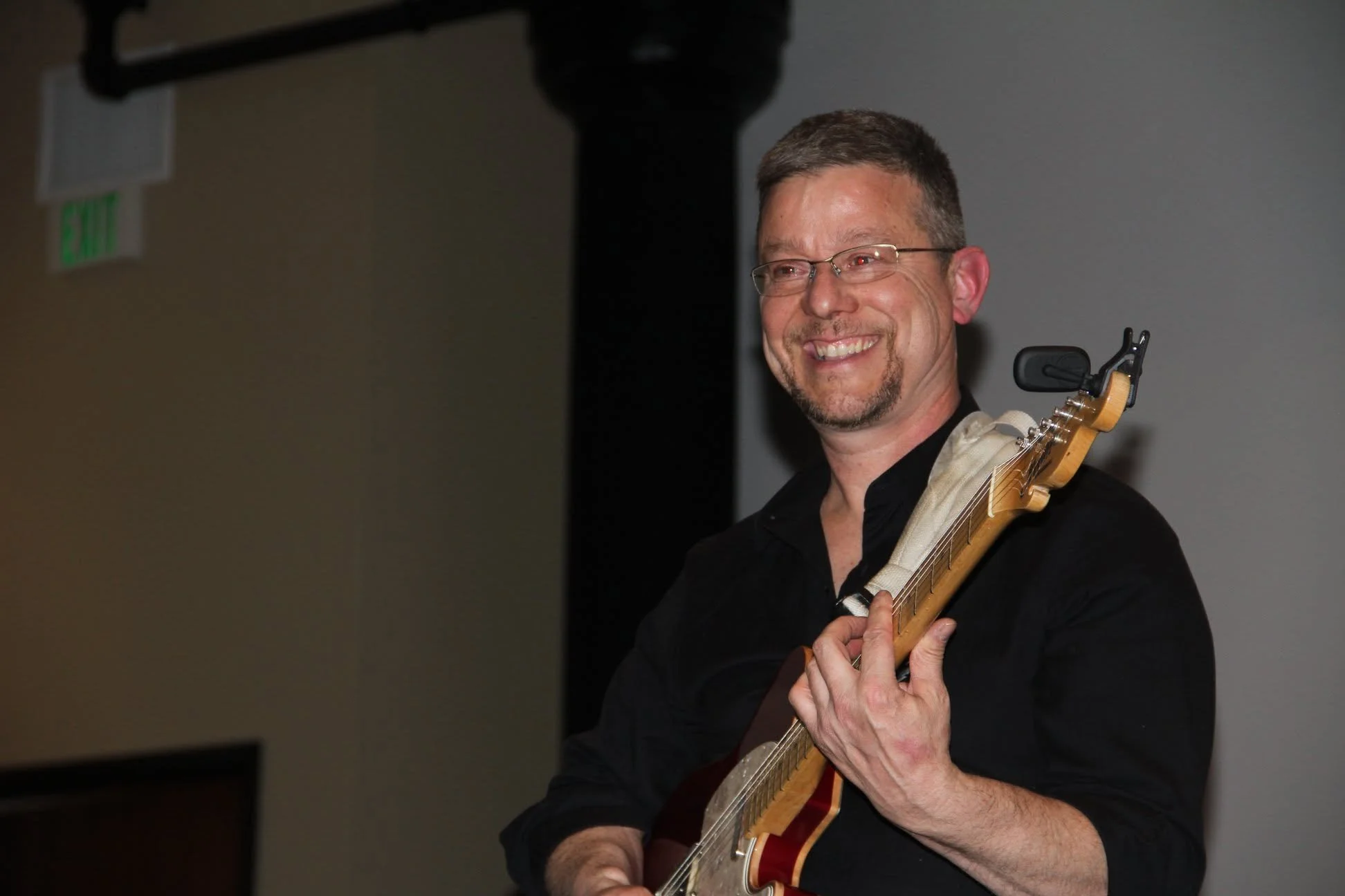 Dale Neville perfomring at a private event.