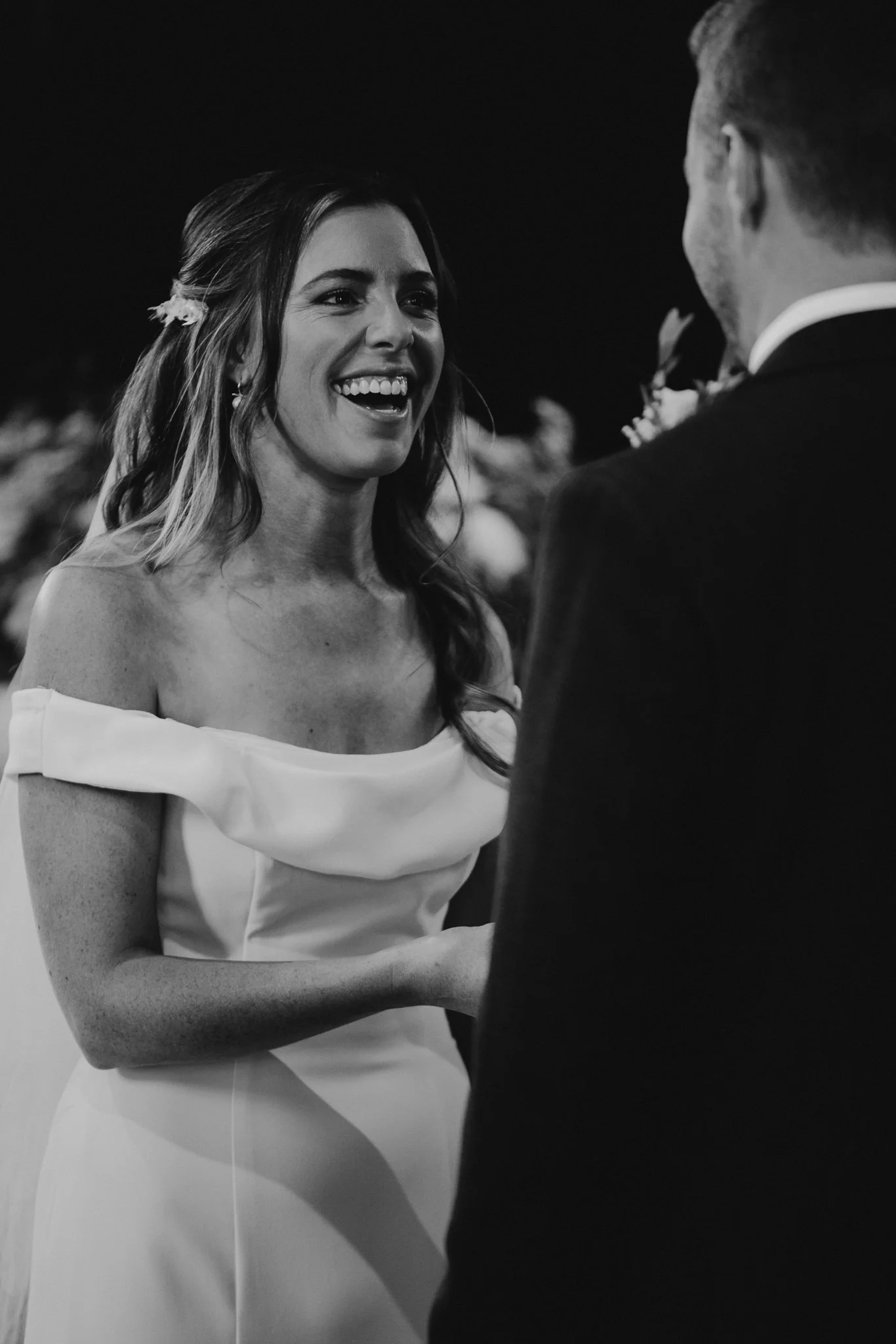  The Bride laughing during the ceremony at All Saints Chruch Hampton 
