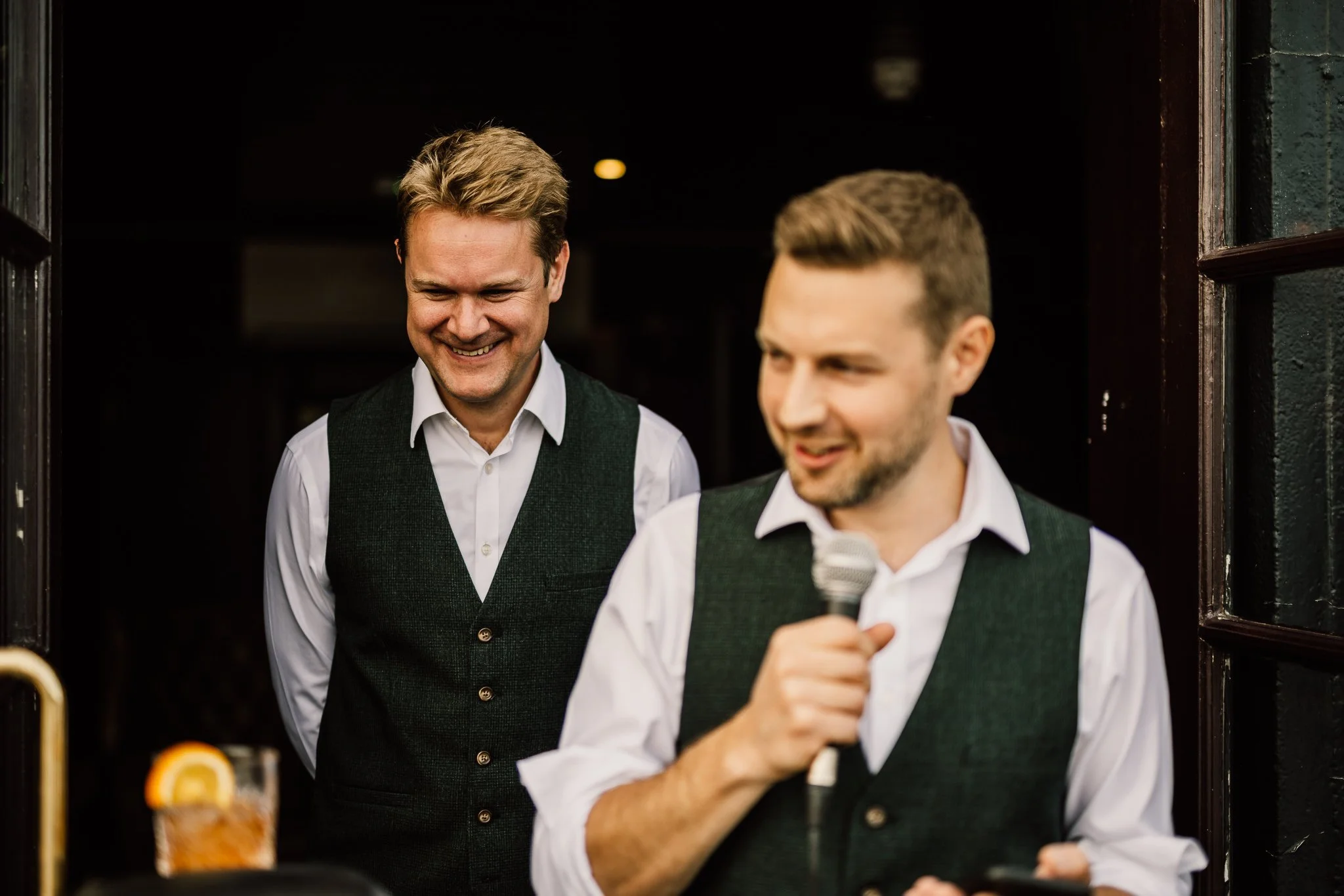  Groom and his brother during the wedding speeches 