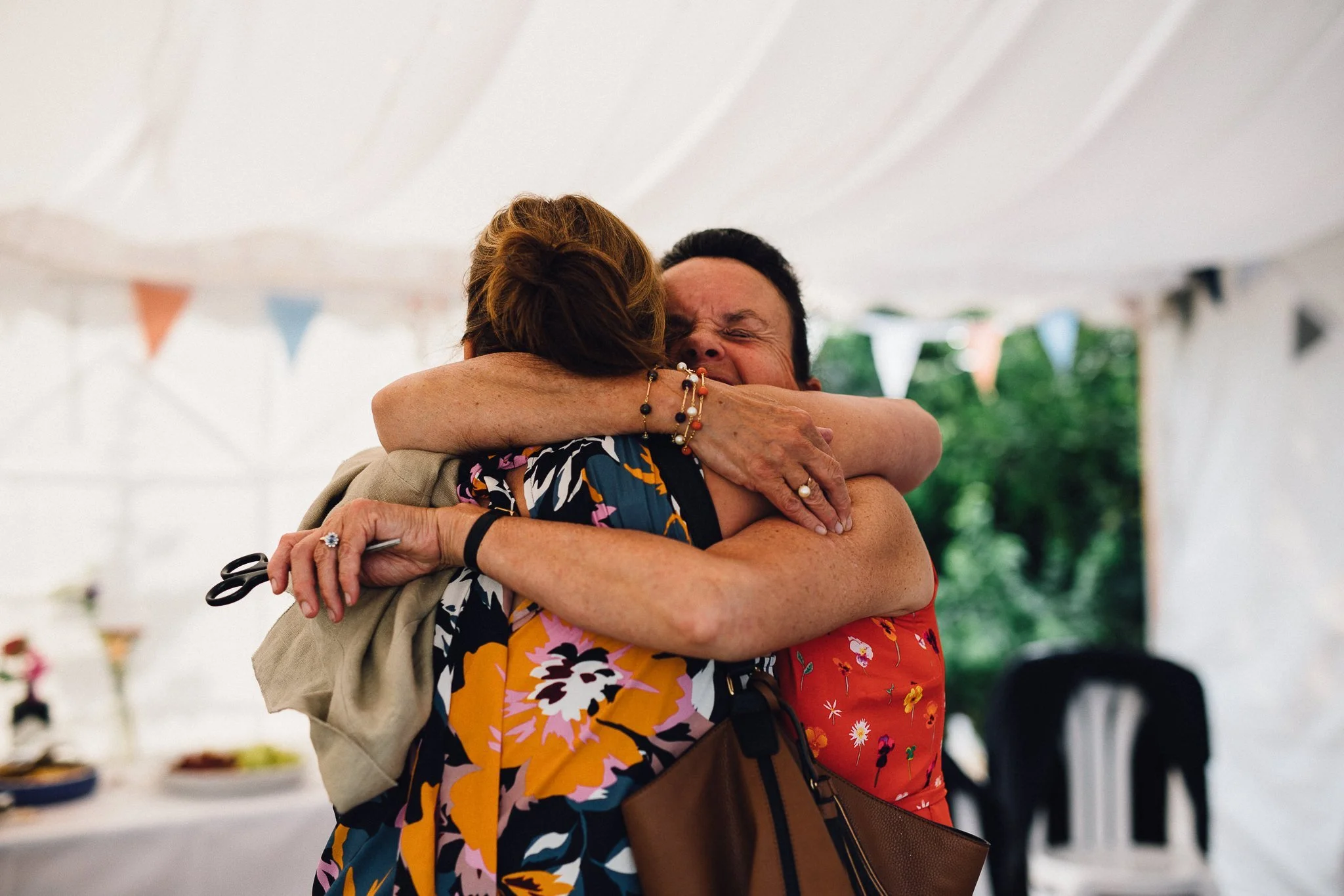  Wedding guests hugging 