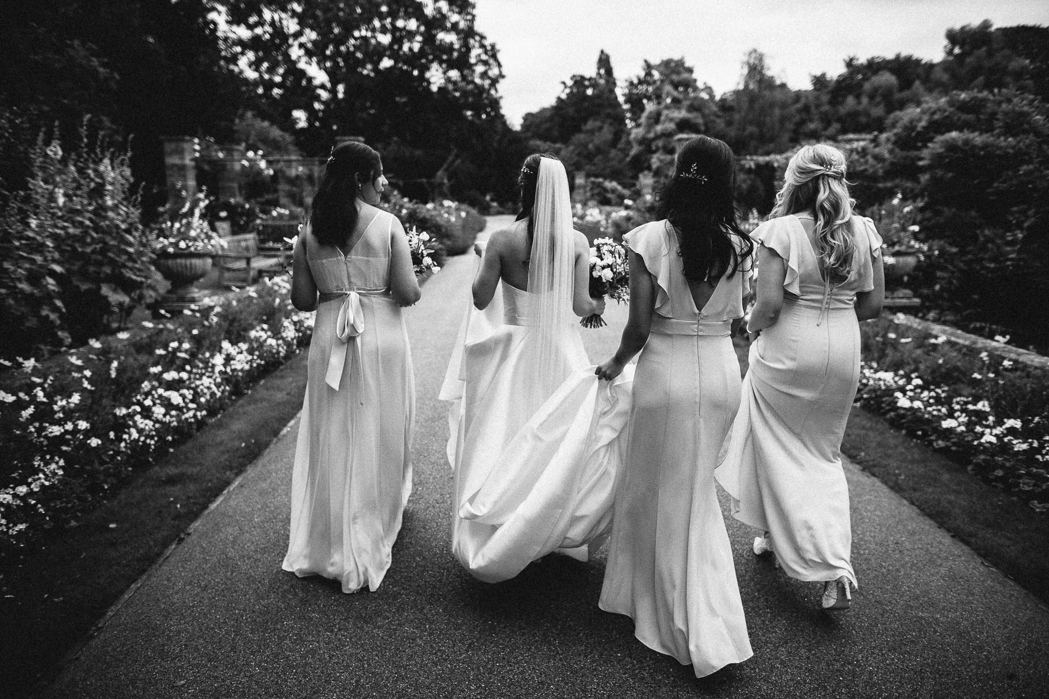  Bride and Bridesmaid’s walk through the gardens of The Hurlingham Club  