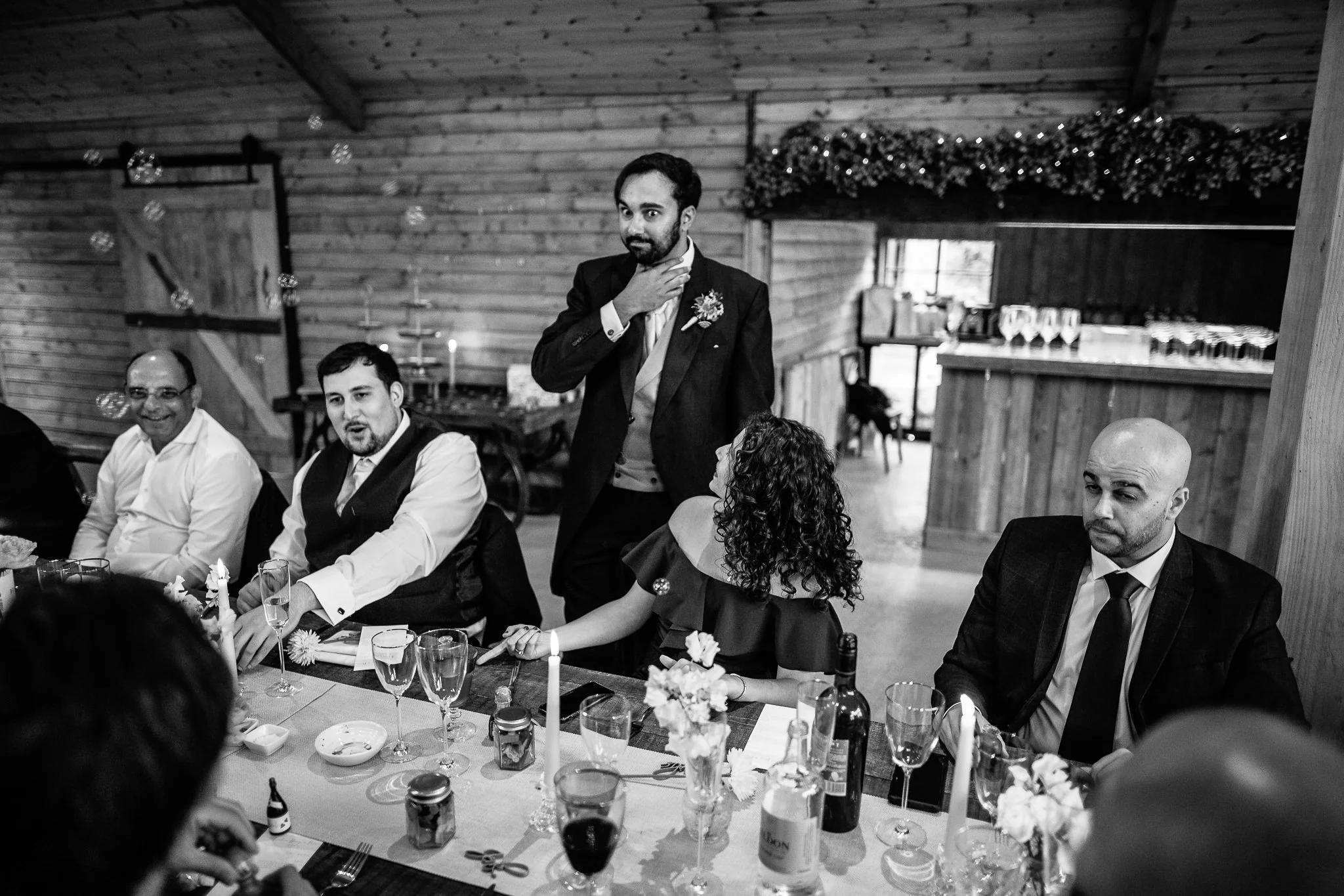  Groom after drinking a shot with his friends at  Orleans House Gallery 
