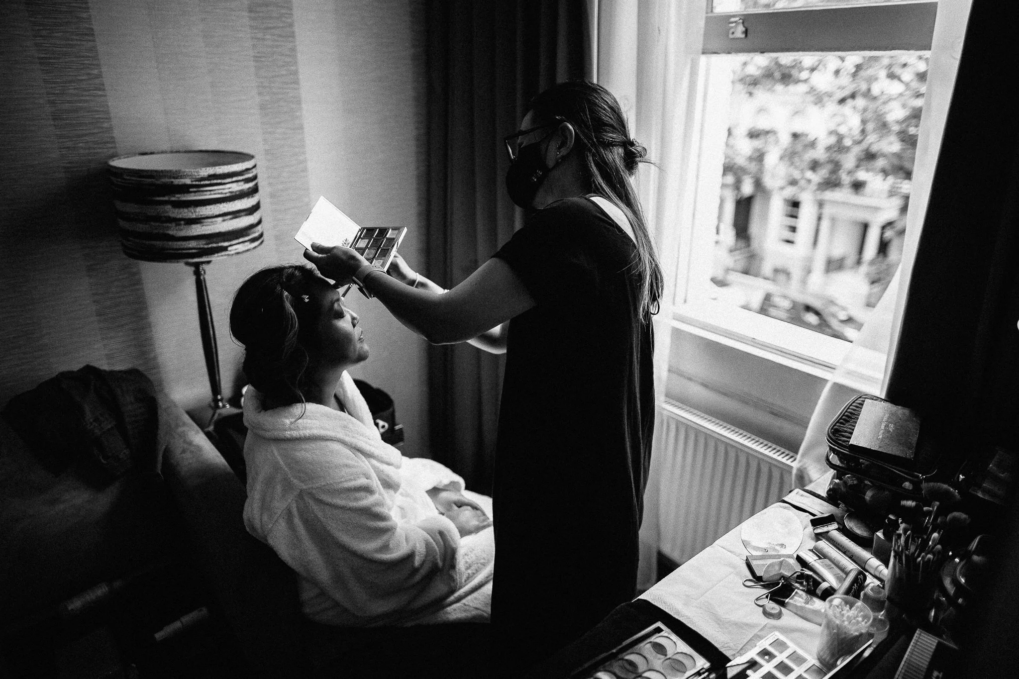  Bride gets ready for her wedding at  Islington Town Hall 