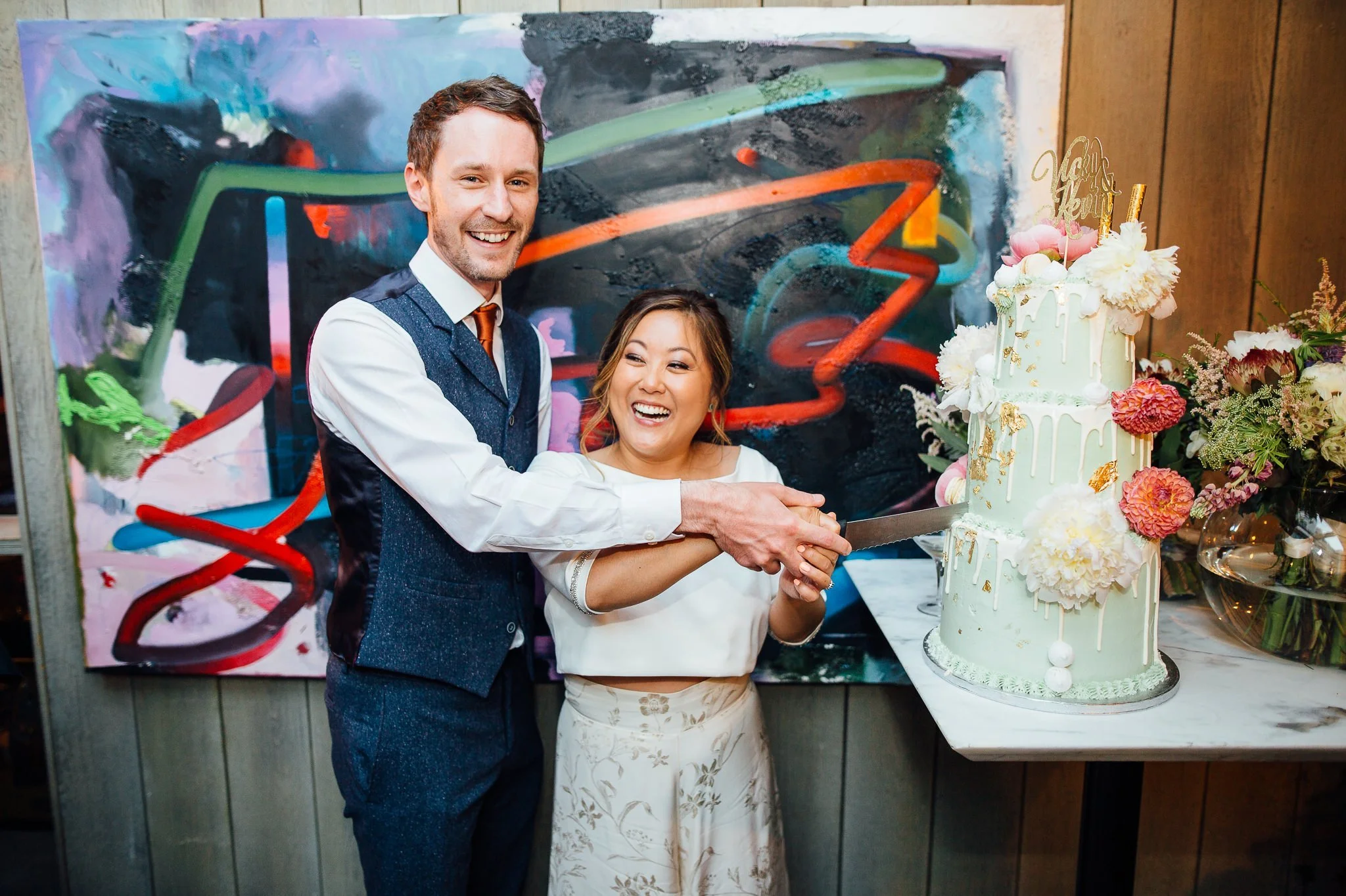  Bride and Groom cutting the wedding cake 