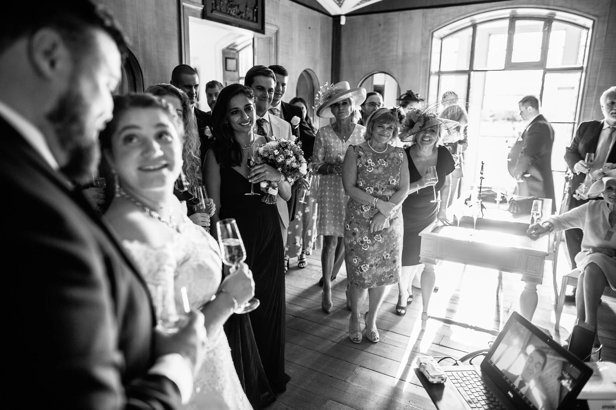  Wedding guests during the speeches at  Pitzhanger Manor 