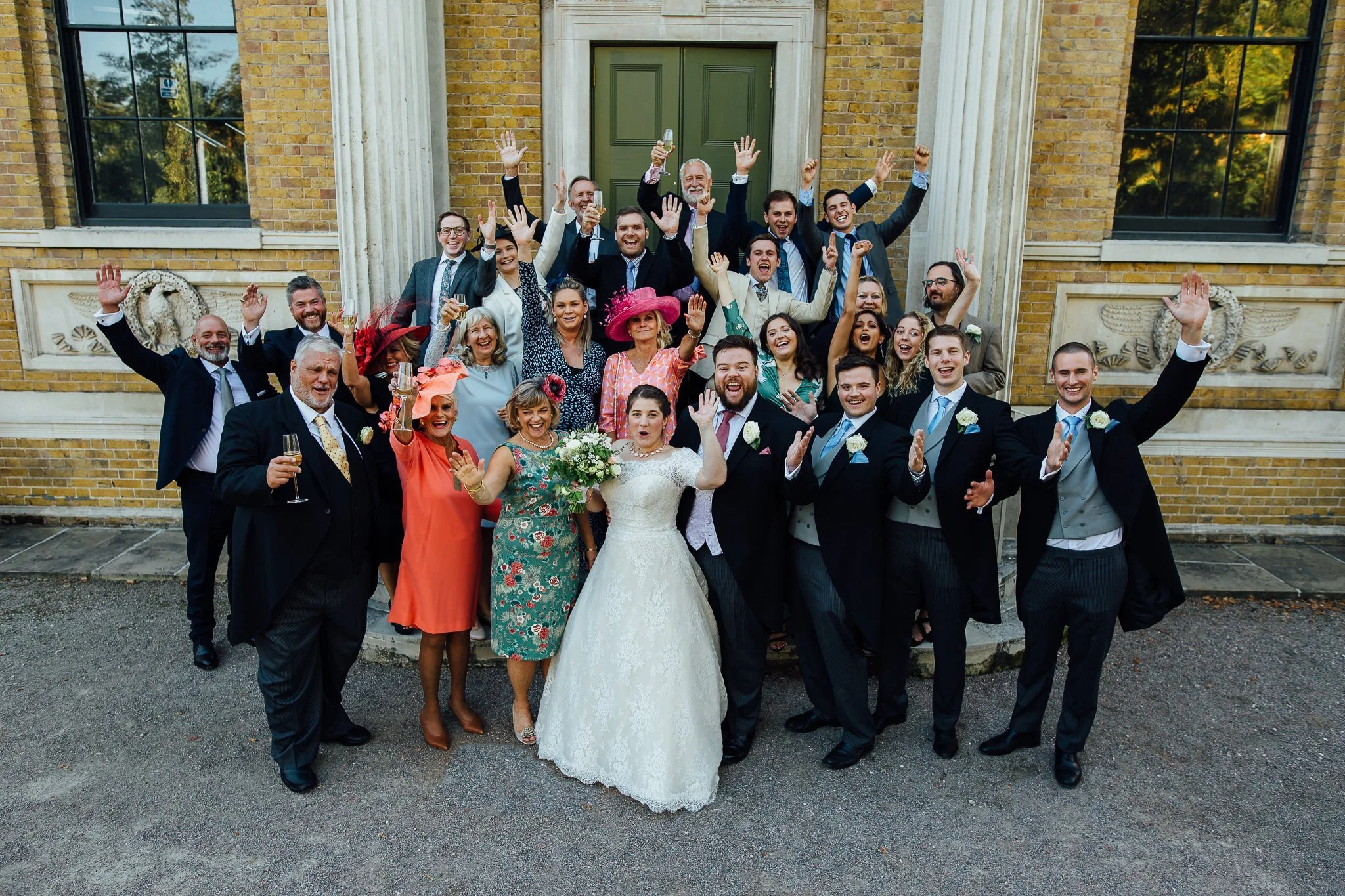  All the wedding guests outside of  Pitzhanger Manor 