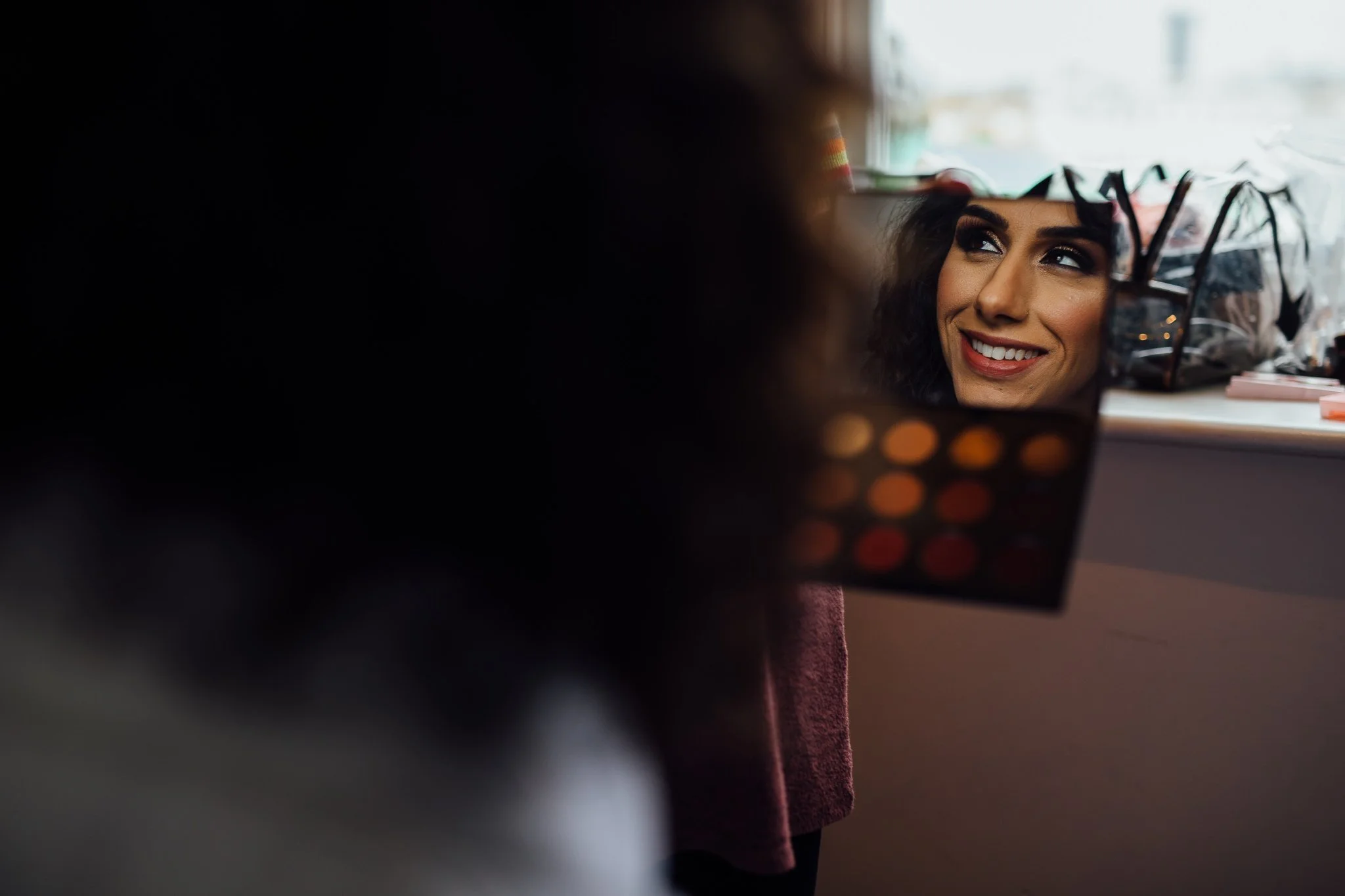  Bride’s reflection in the mirror at One Whitehall Place 