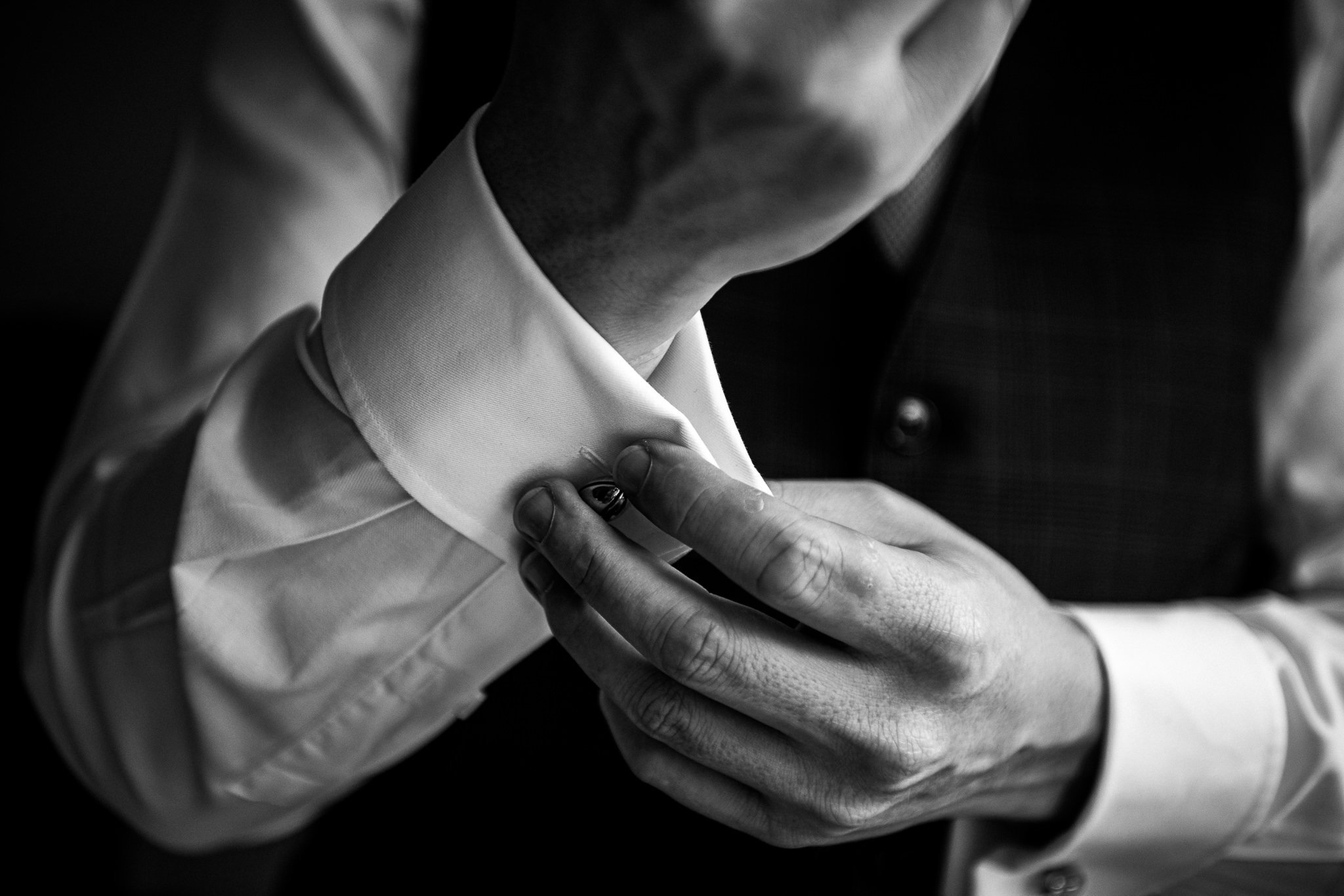  Groom adjusts his cufflinks at One Whitehall Place London 