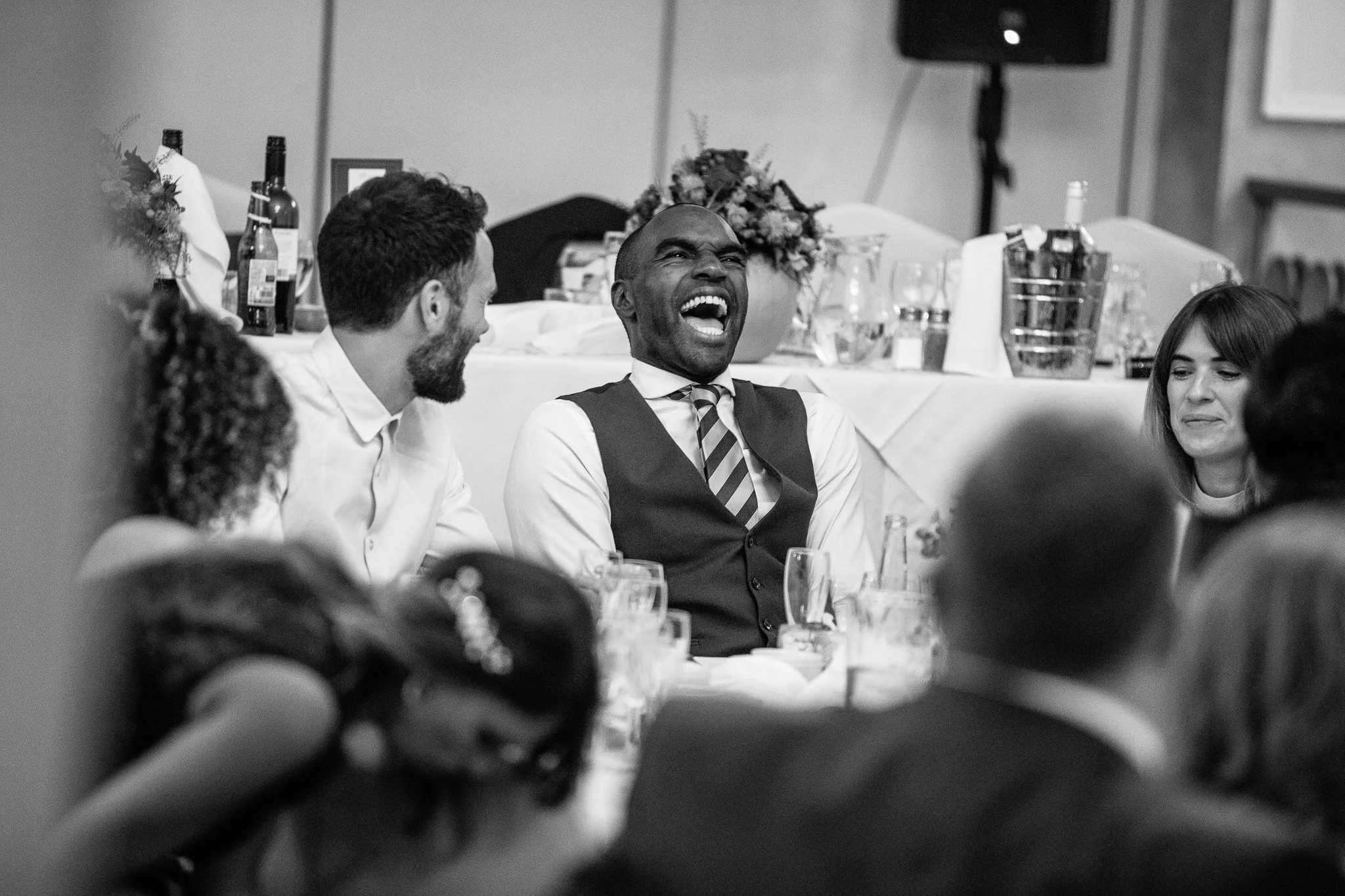  Wedding guest laughing 