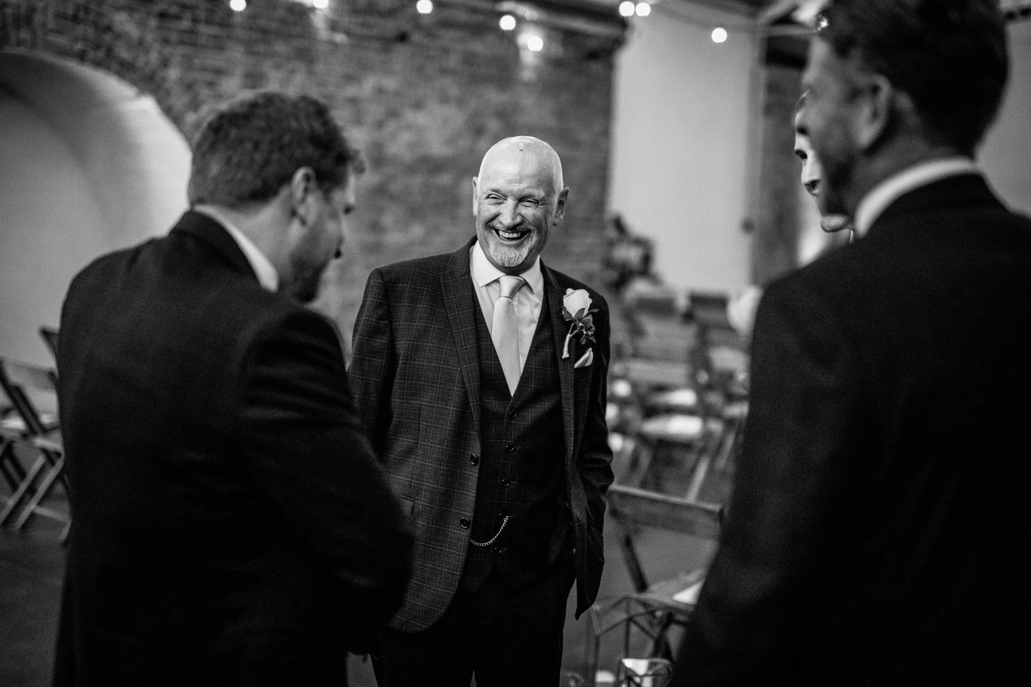  Wedding guest laughs 