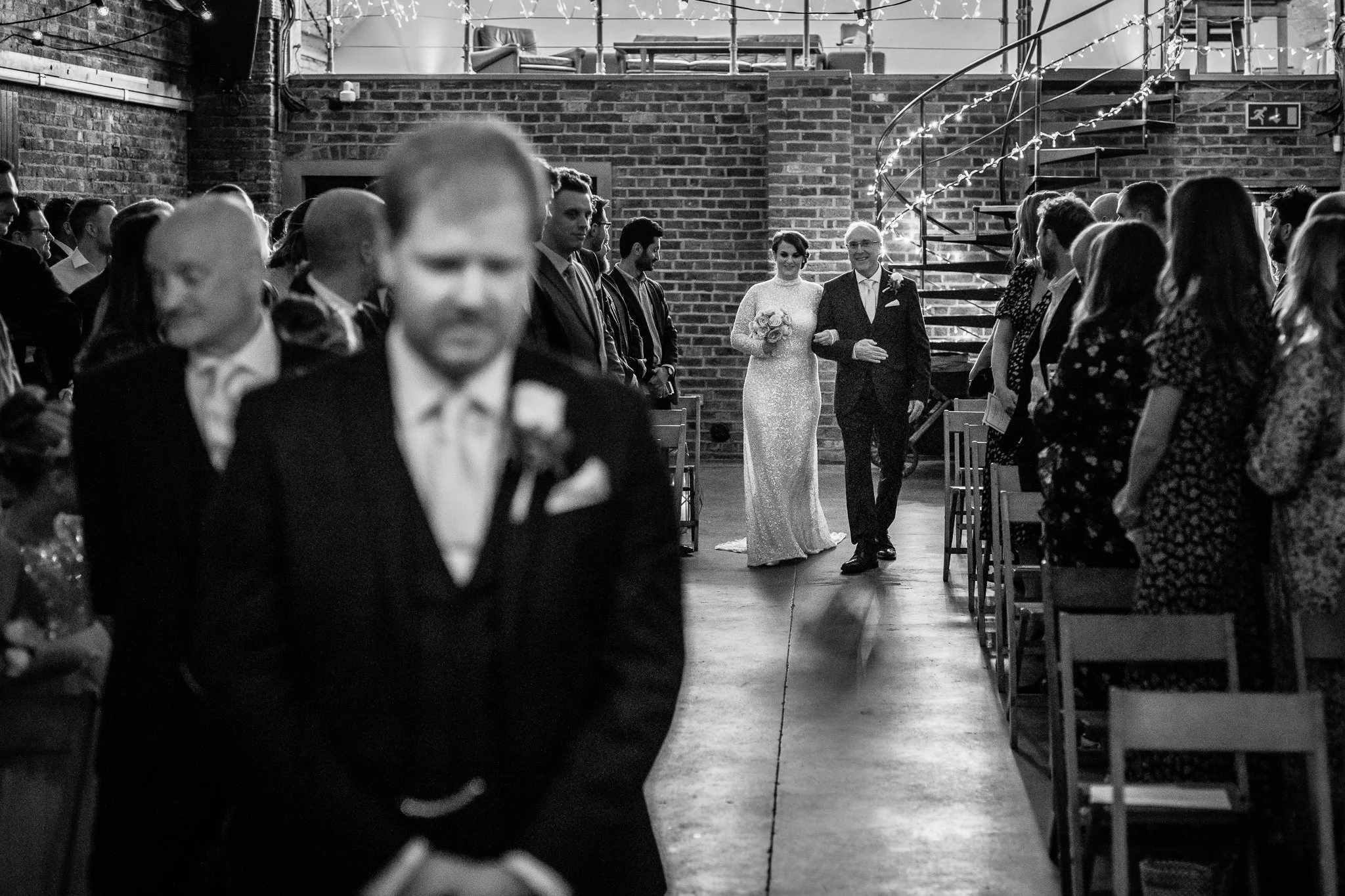  Bride walks down the aisle at Shoreditch Studios 