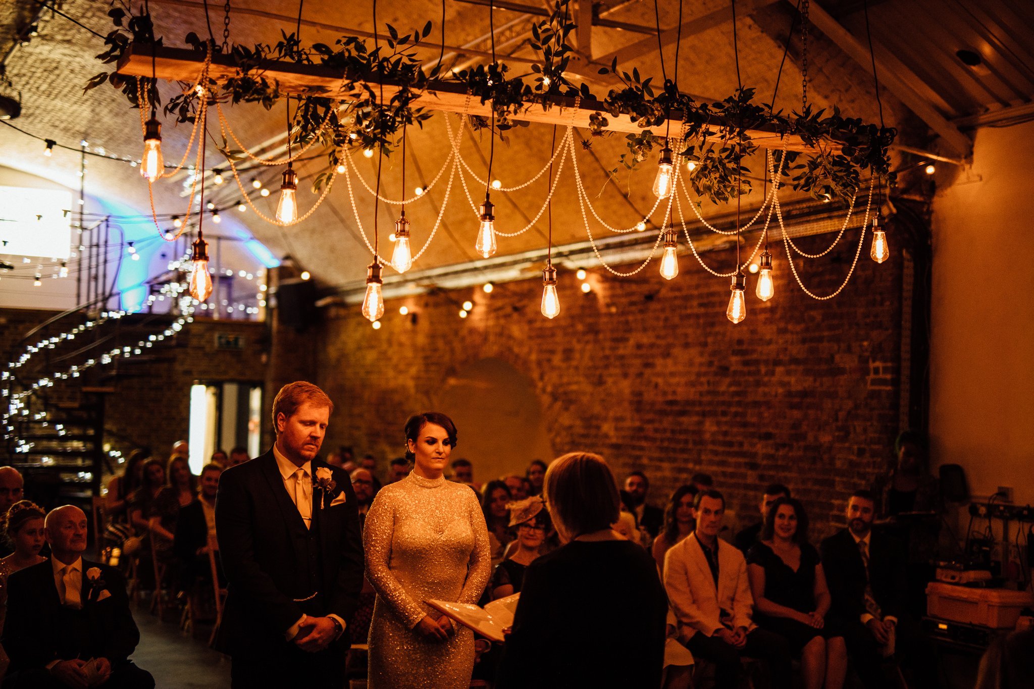  Registrar addresses the Bride and Groom at Shoreditch Studios as they are about to be married. 