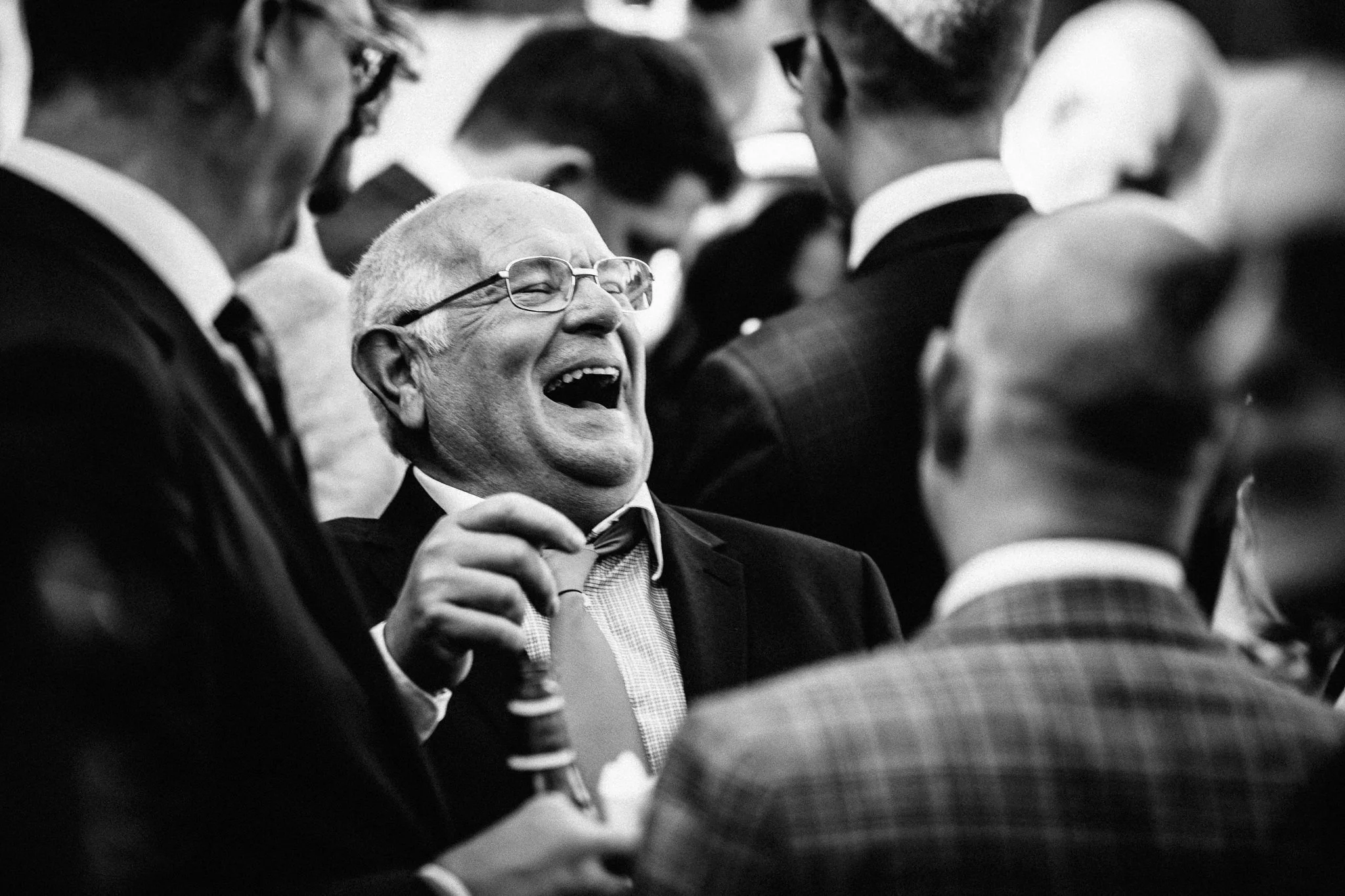  Man laughing heartily. 