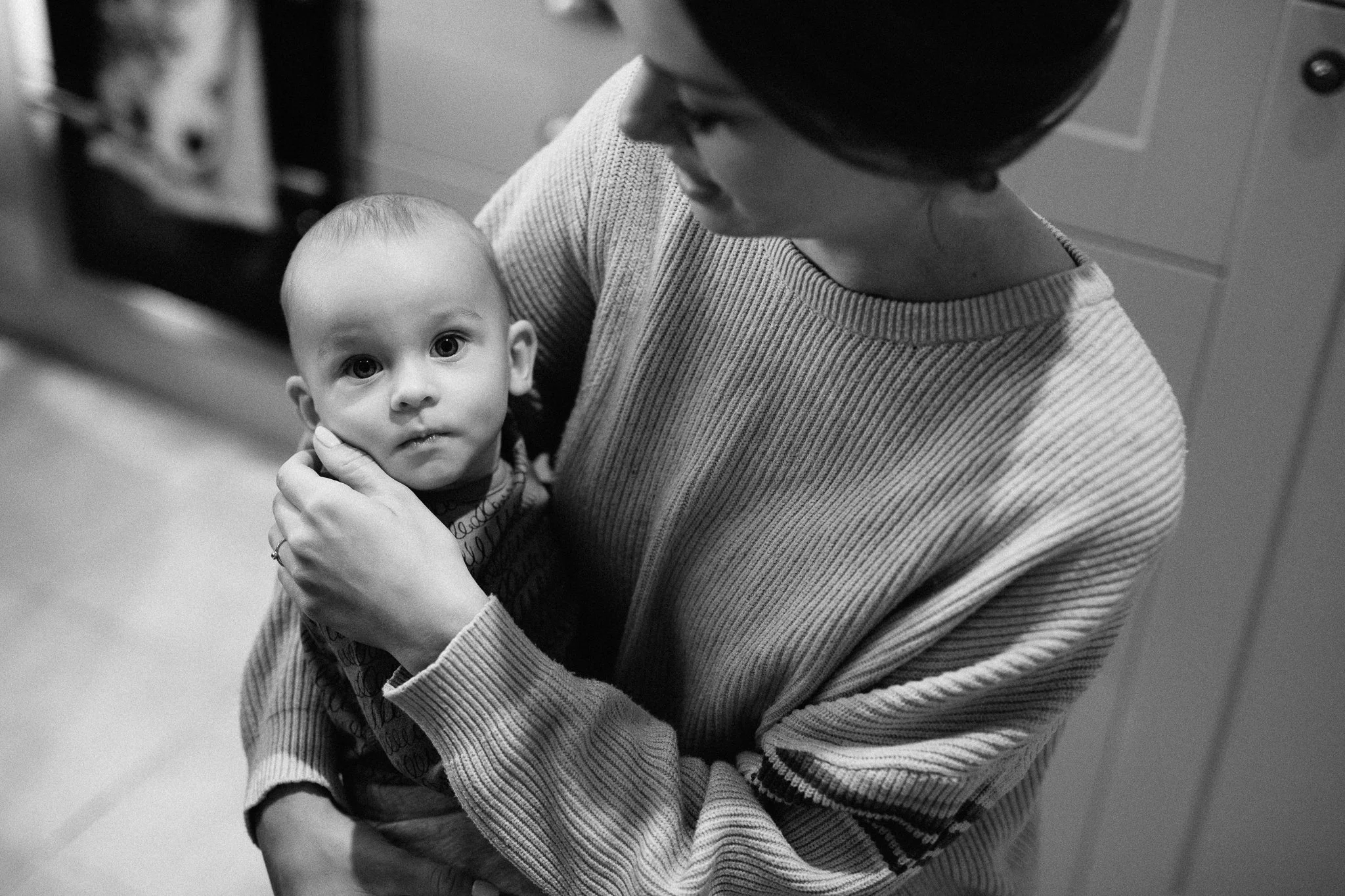  Bride holds one of her twin sons. 