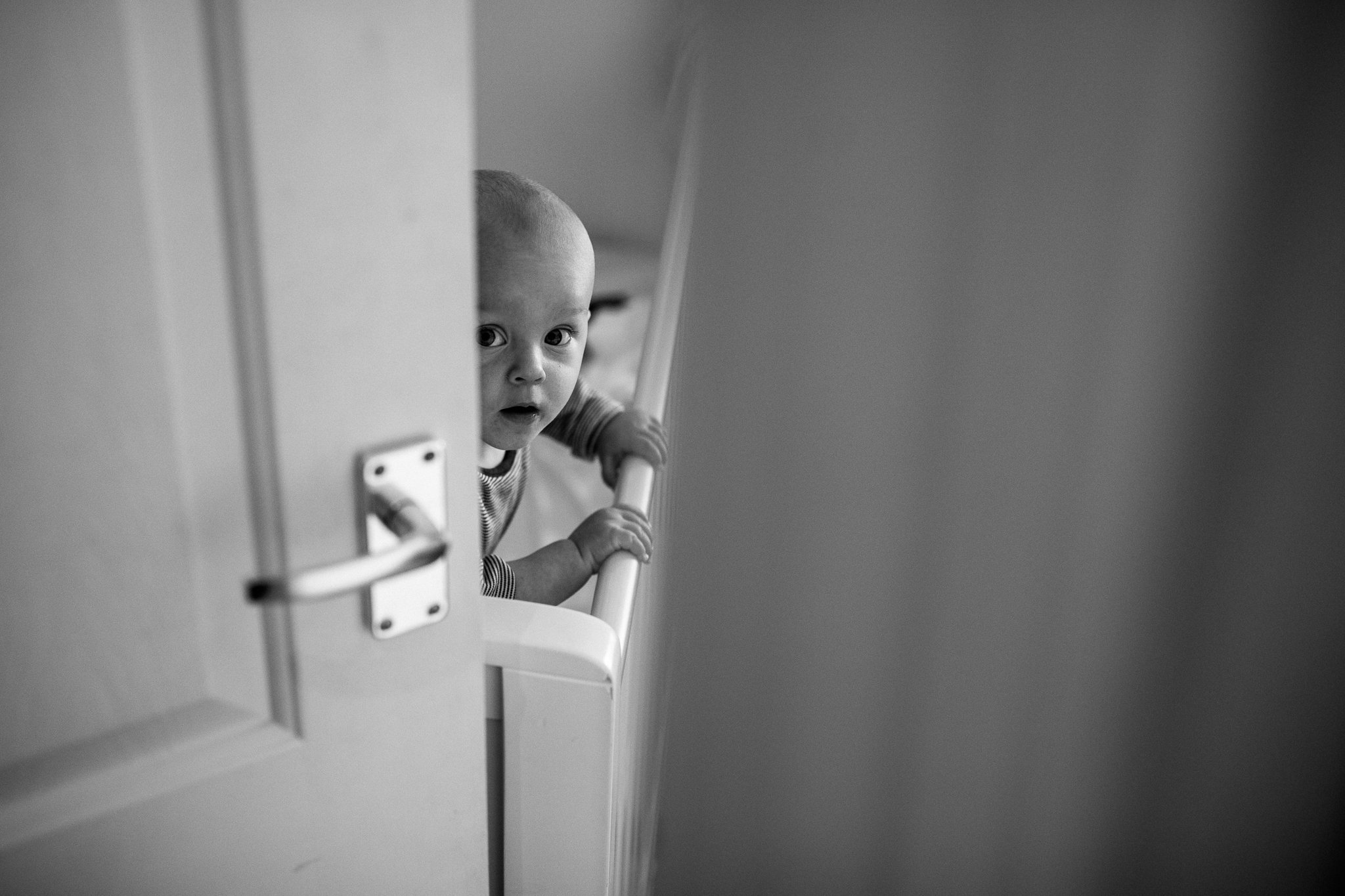  Baby peaks around the door 