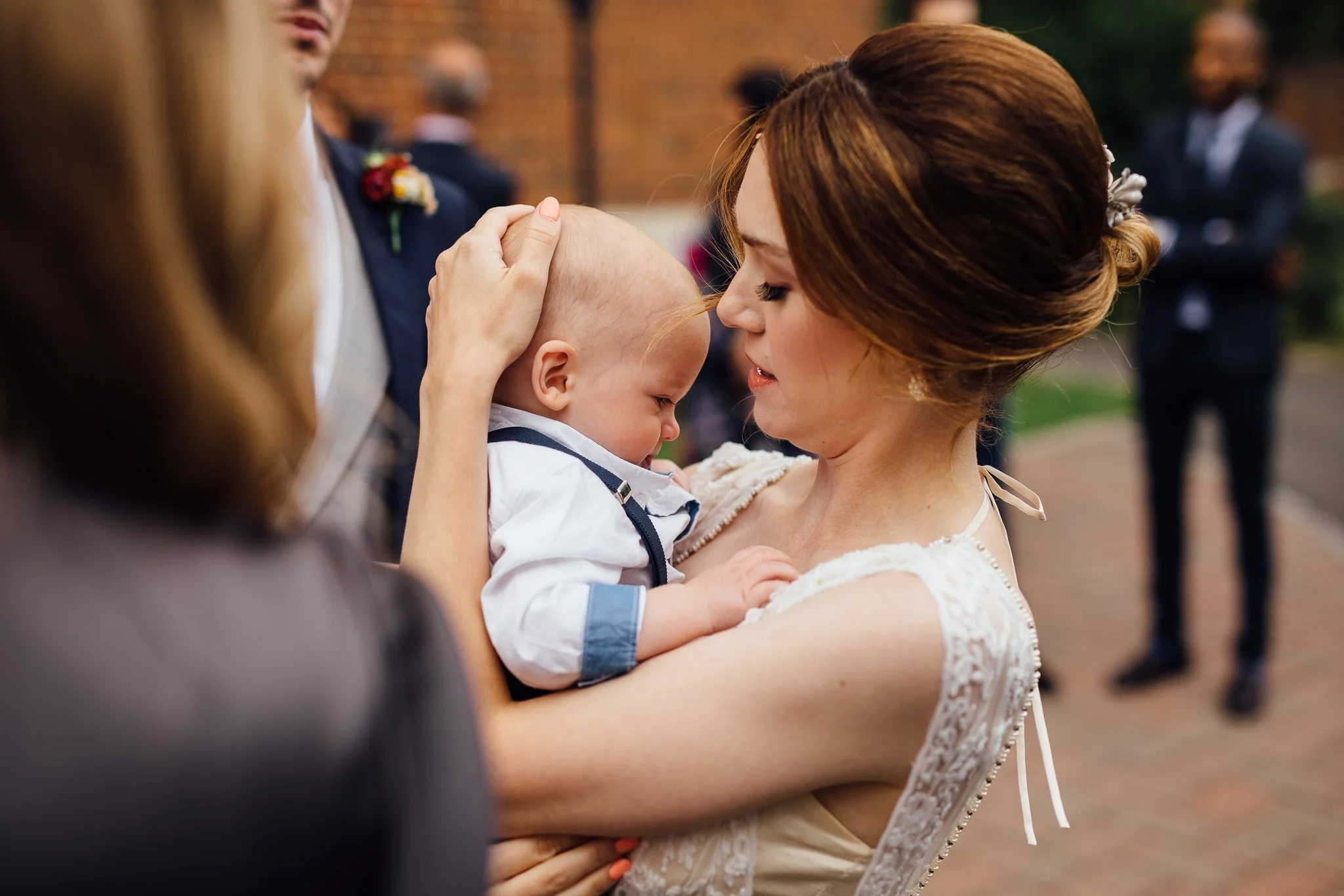  Bride hugs her son 