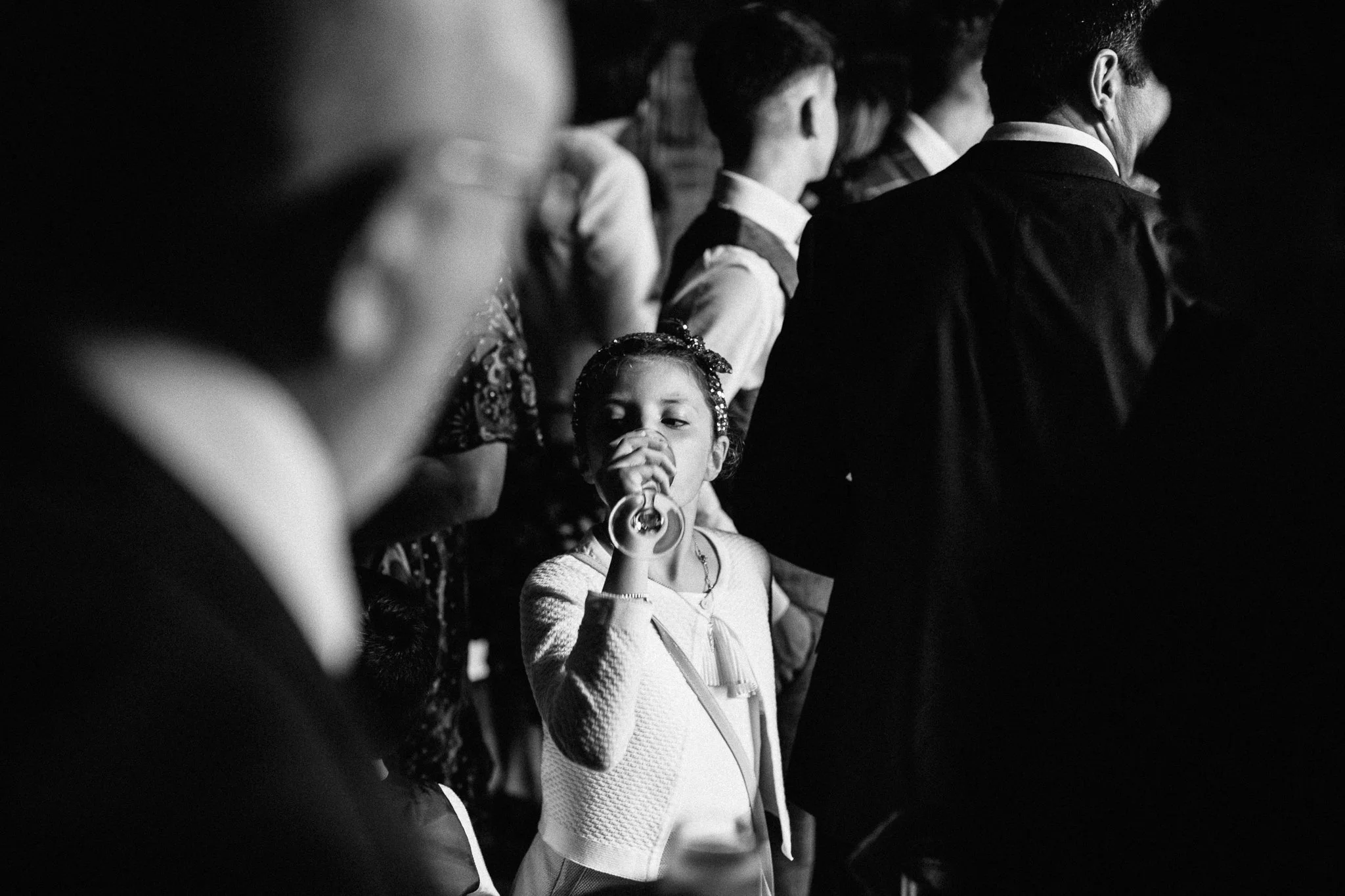  Young wedding guest drinks 