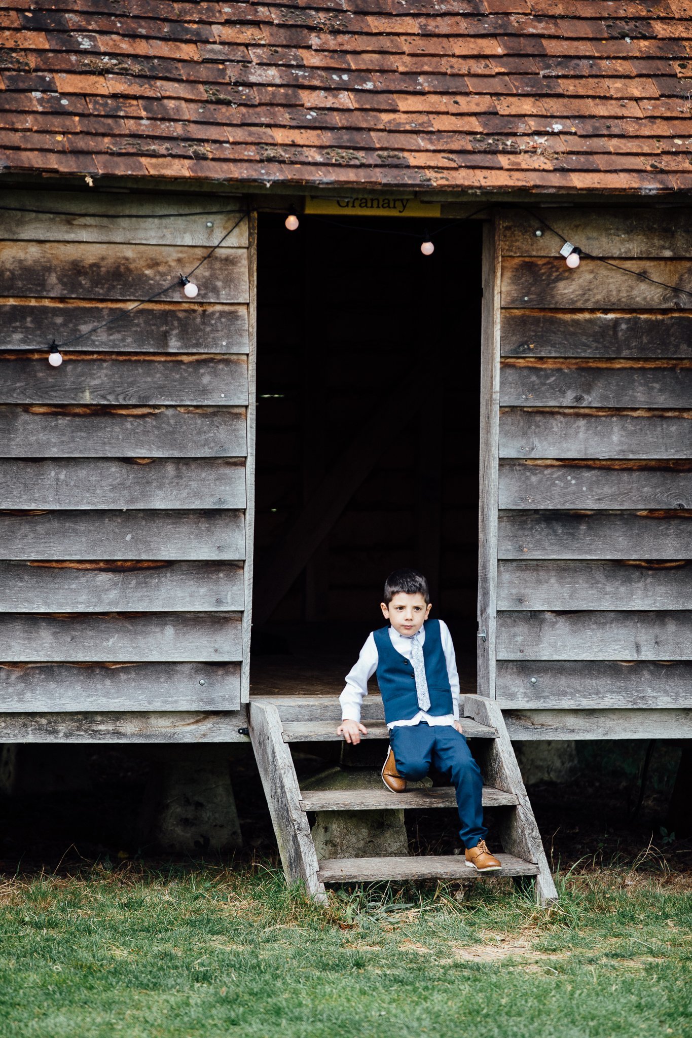  Child sets on a set of stairs 