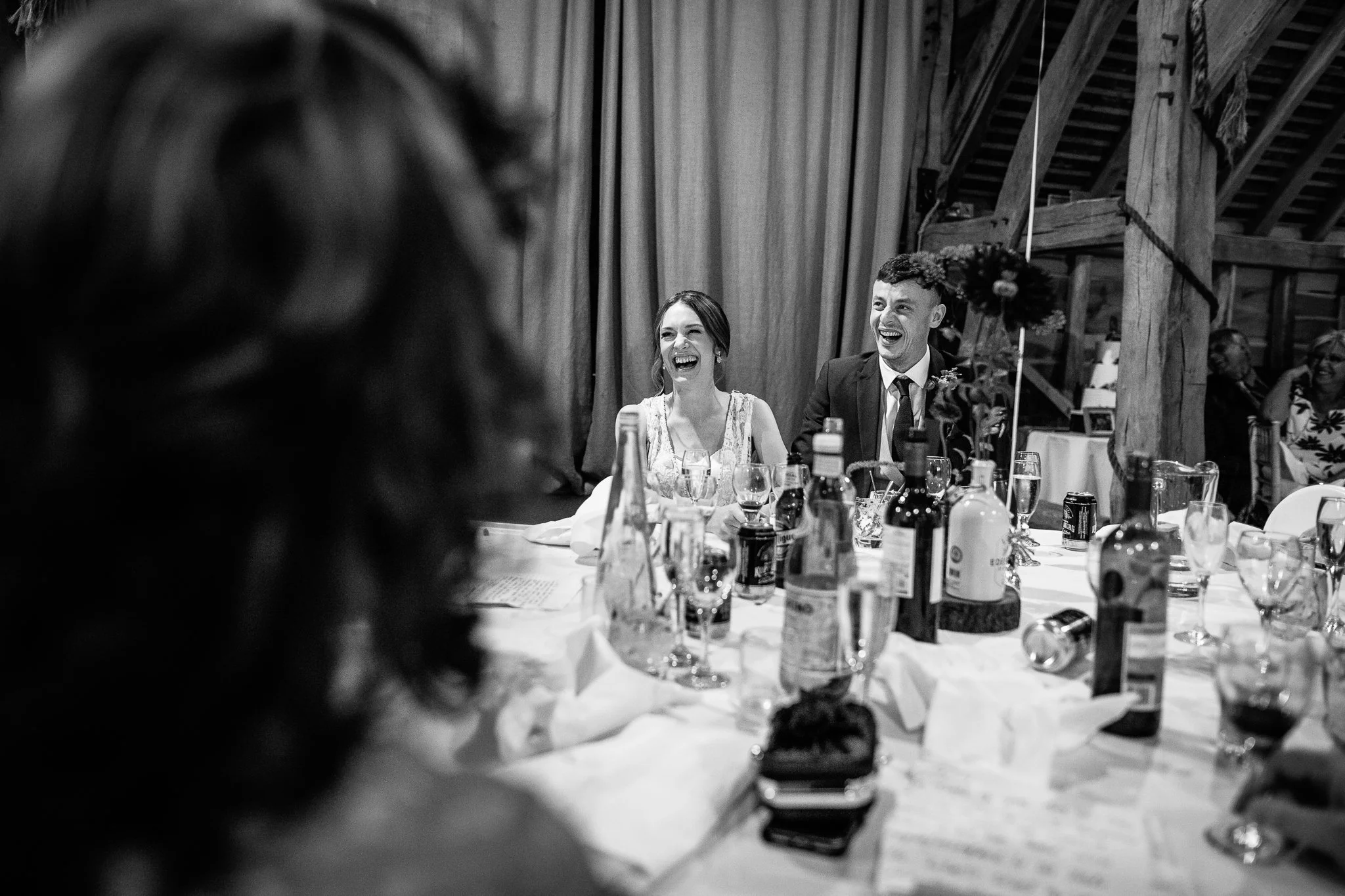  Bride and Groom laughing at the speech 