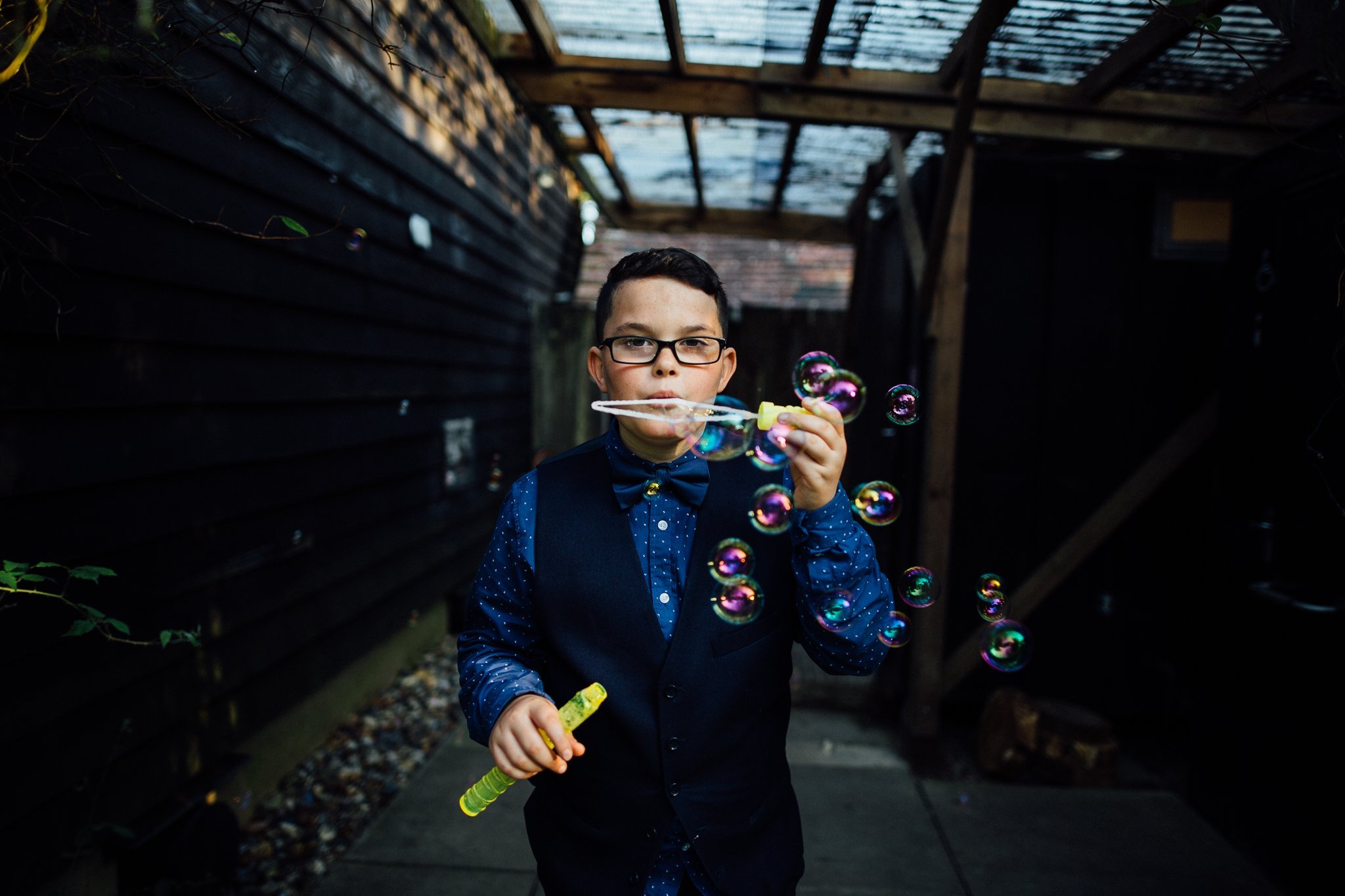  Child blowing bubbles 