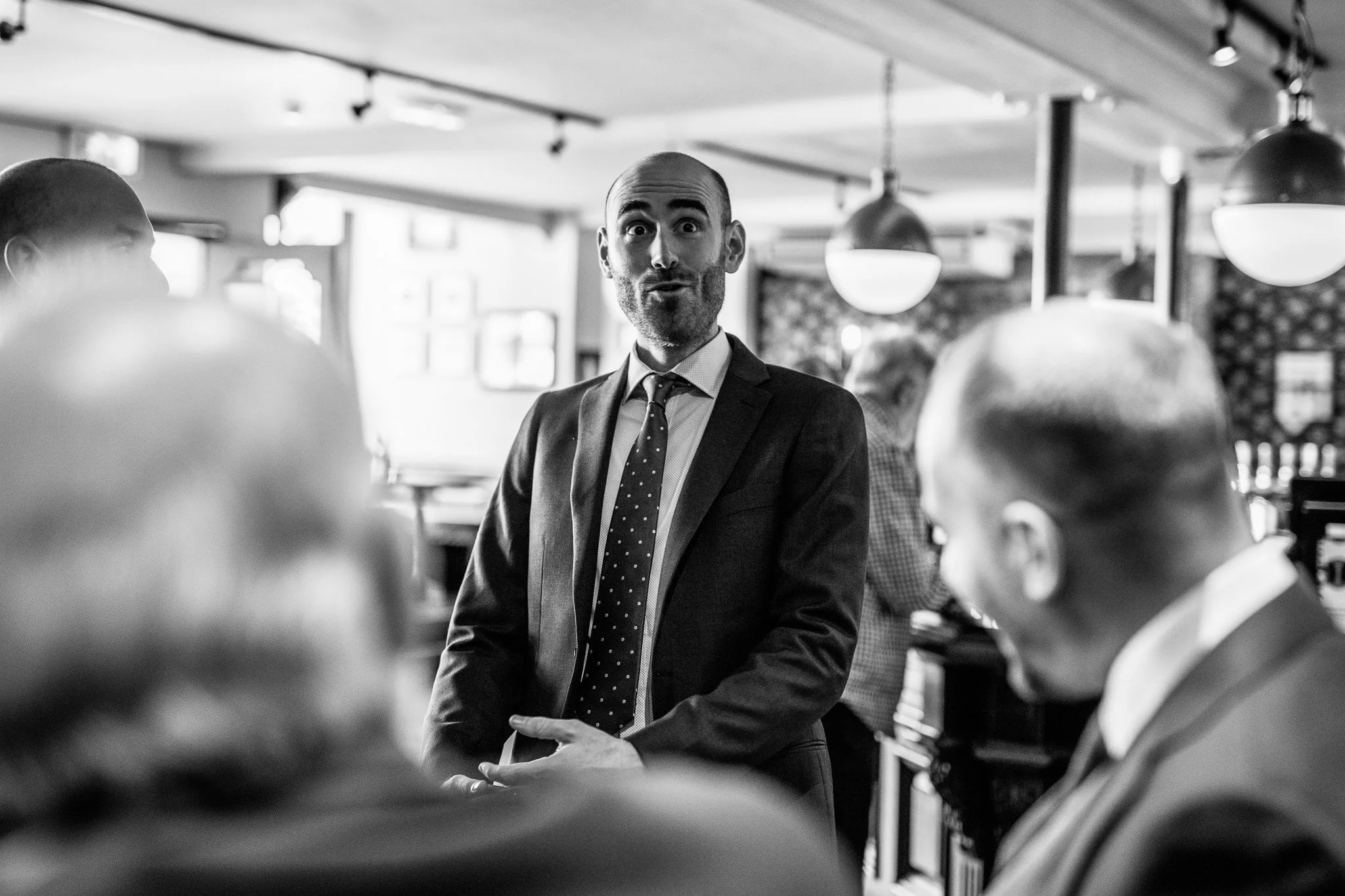  One of the Groomsmen pulls a funny face 