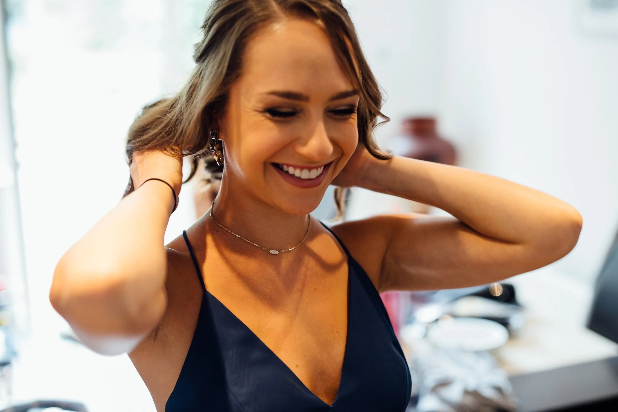 A bridesmaid smiles 