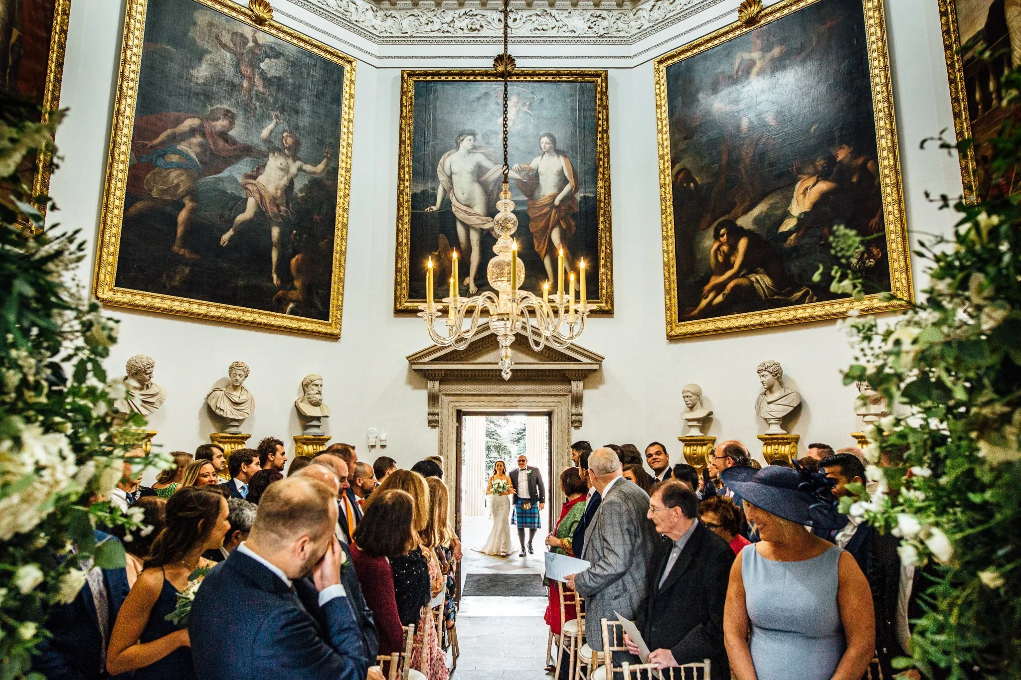  Groom is overcome with emotion as the bride walks into the ceremony room 