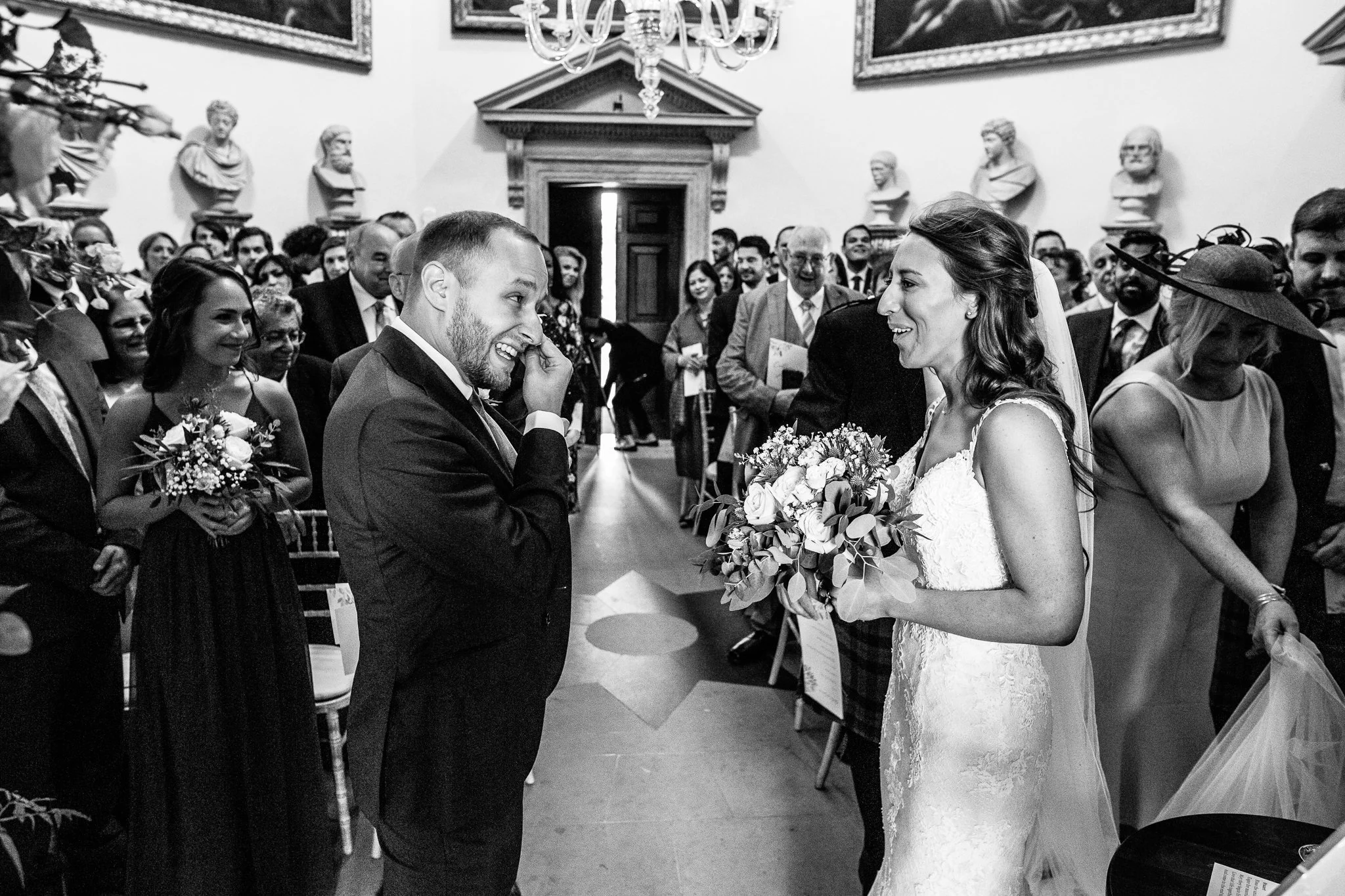 The Groom wipes away a tear at Chiswick House in the ceremony room 