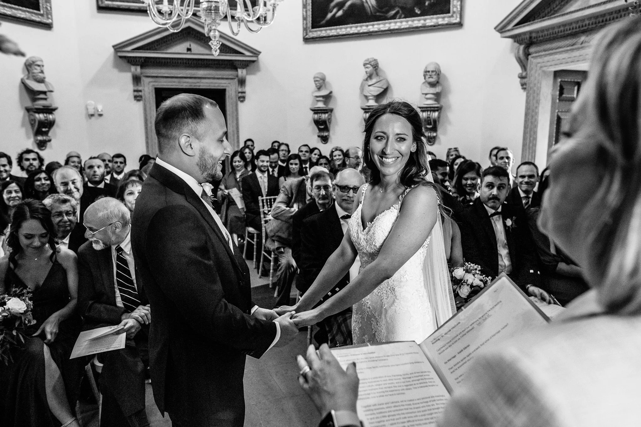  Bride smiles at the registrar  