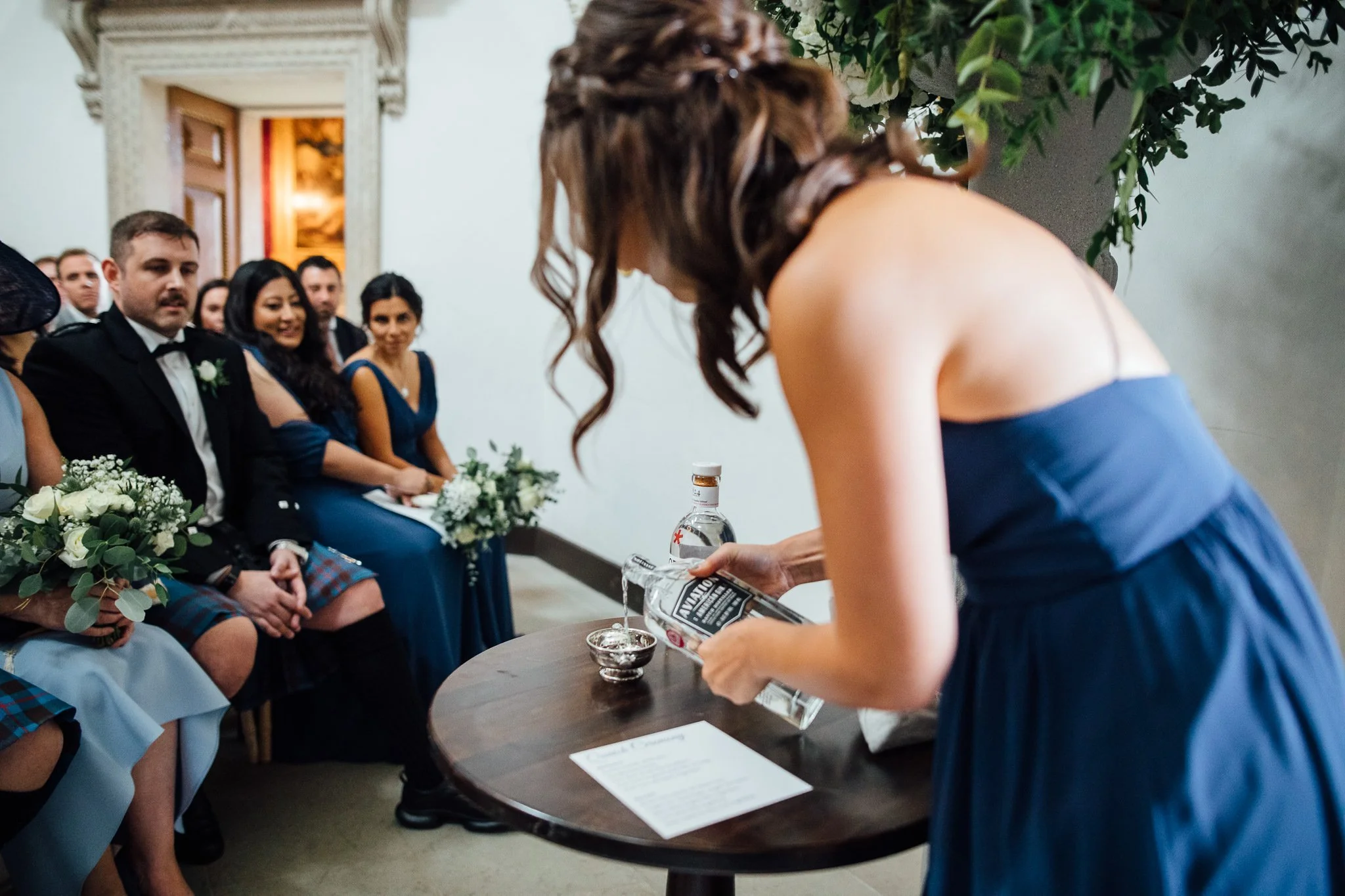  Sister of the Groom pours some gin 