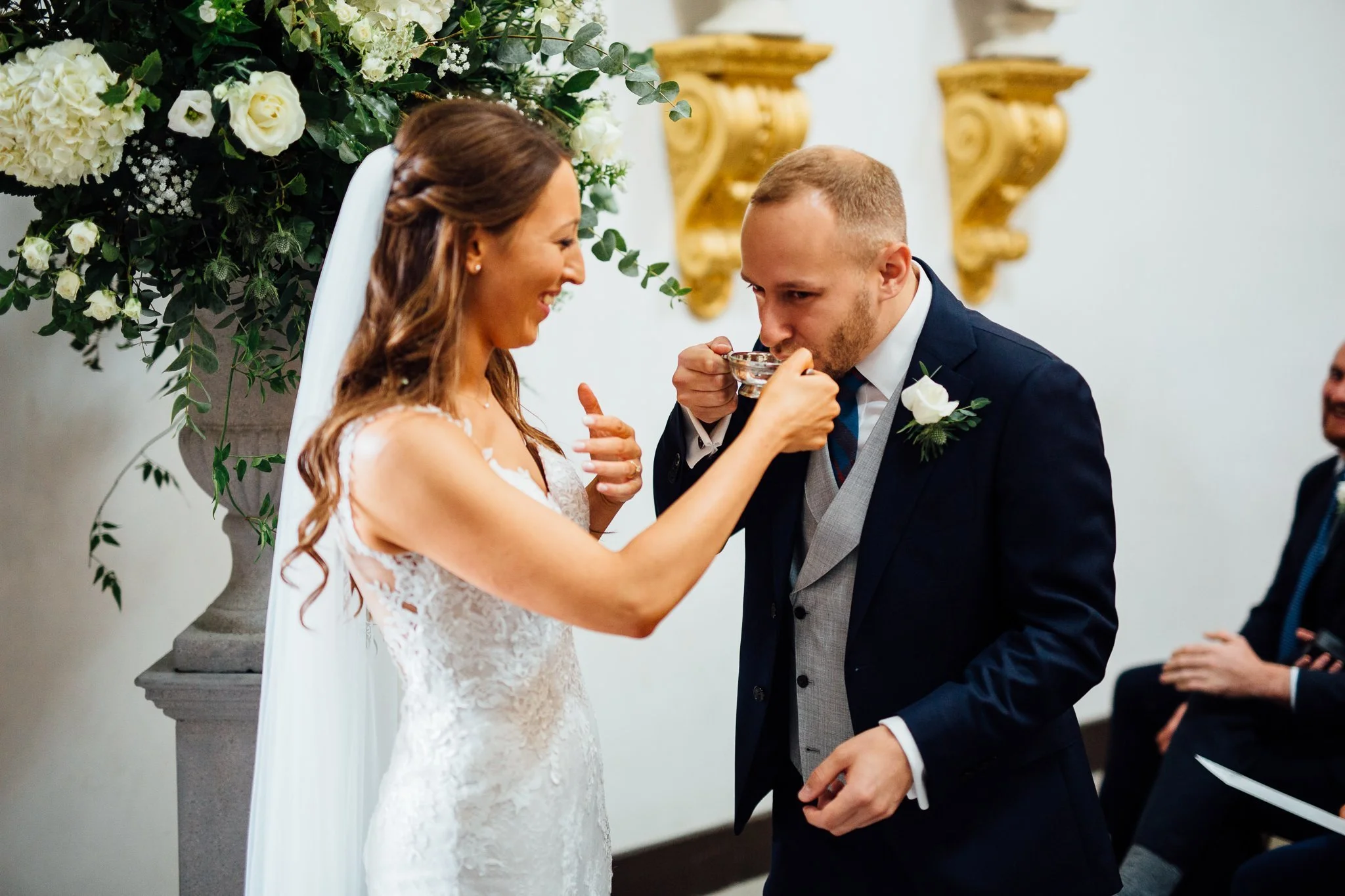 Groom drinking the gin 