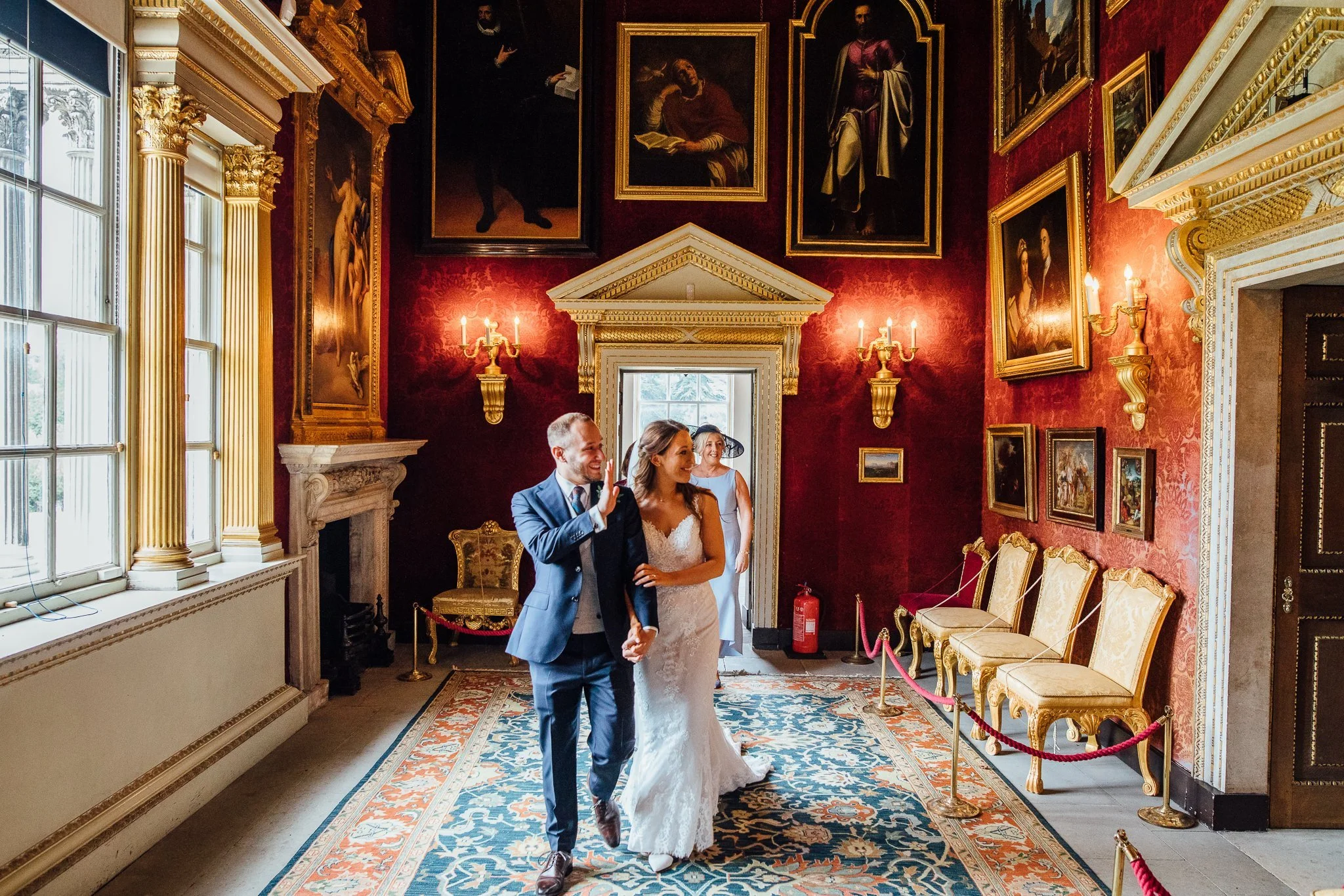  Bride and Groom walk arm in arm to sign the marriage document at Chiswick House 