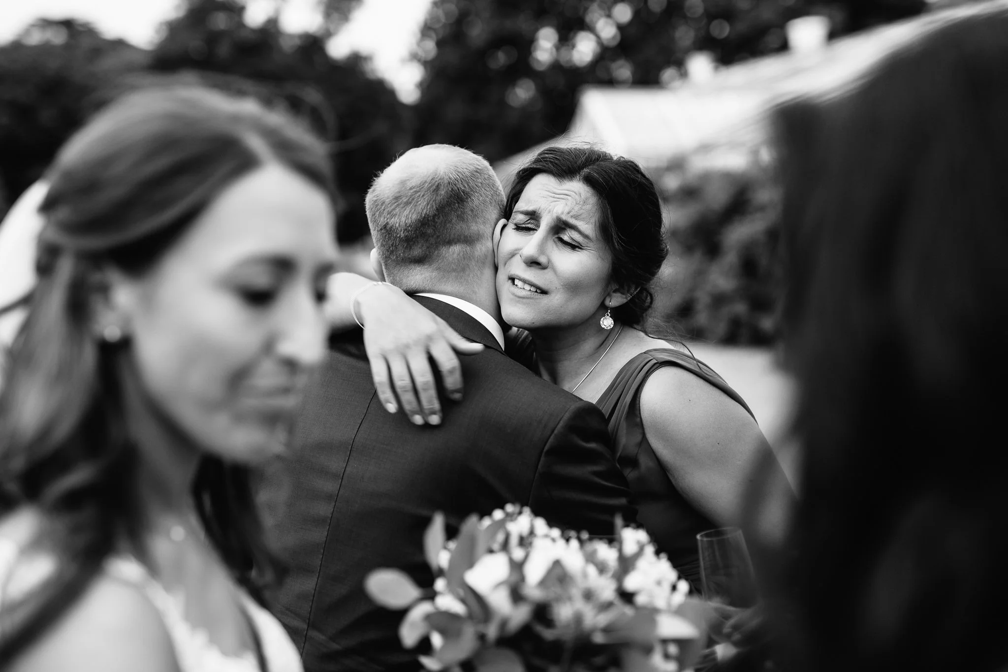  Guest hugging the Groom 