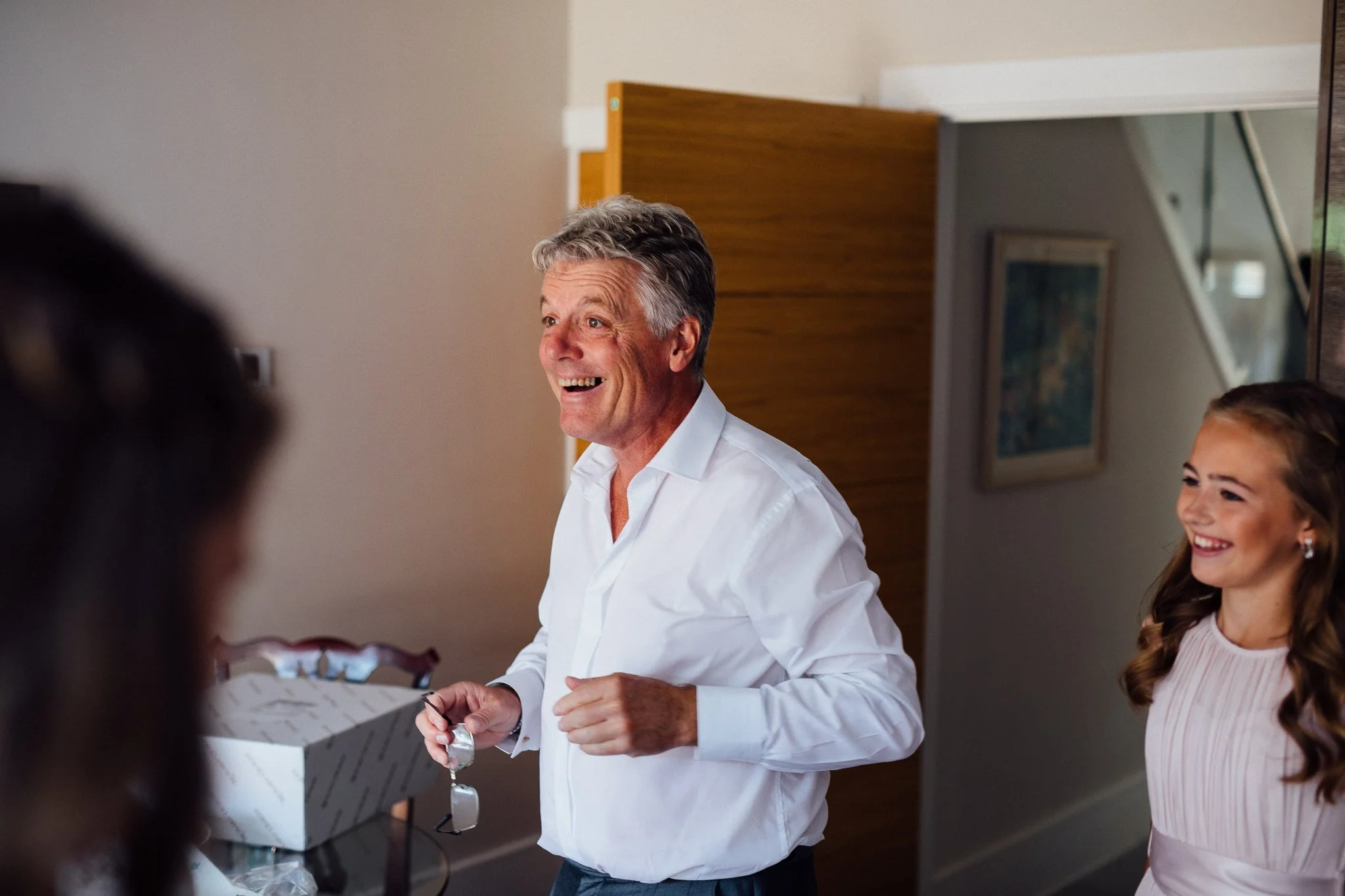  The father of the Bride see’s her in her dress for the first time 