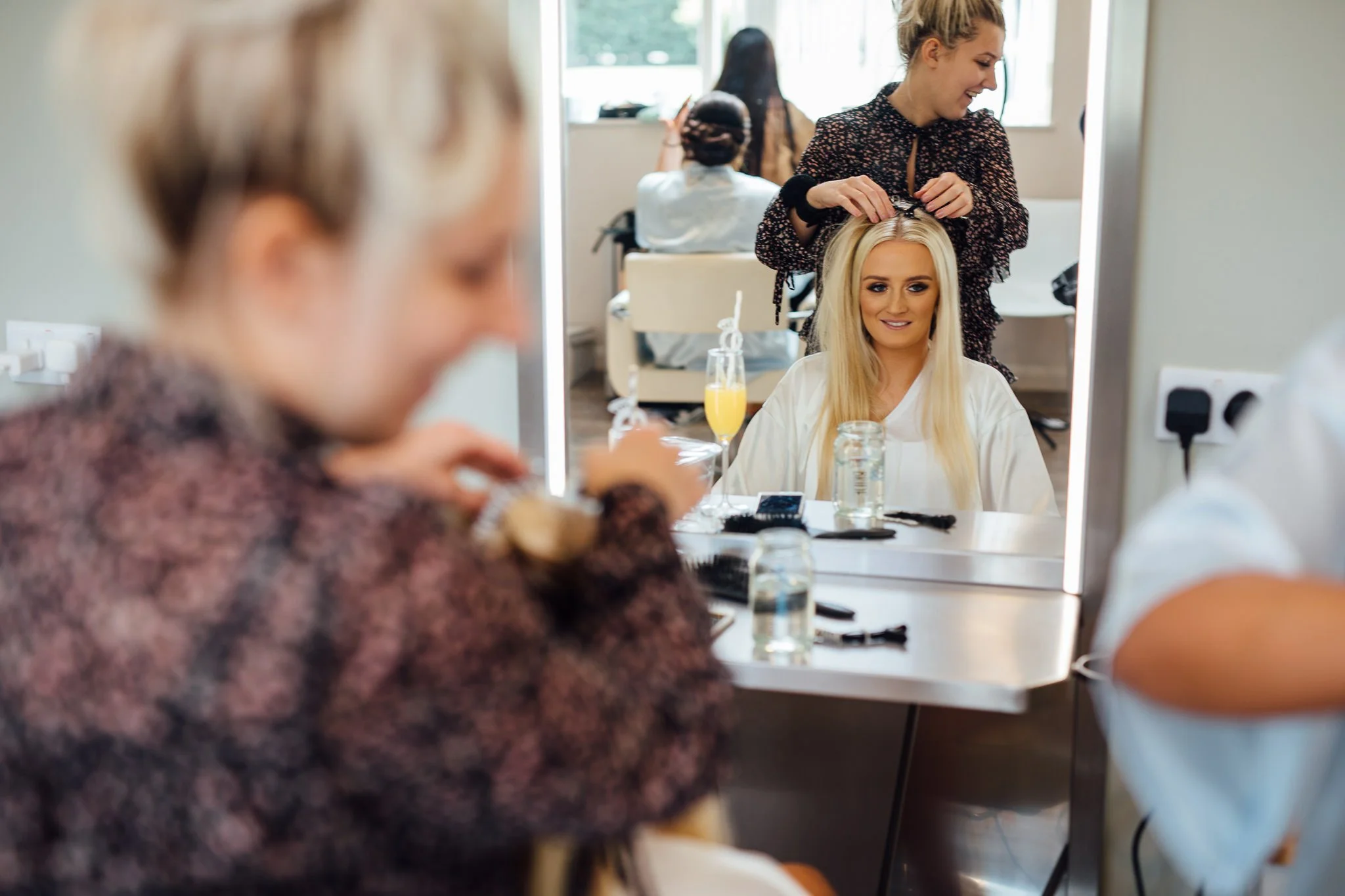  Bride has her hair done at Winters Barns Wedding Venue Kent 