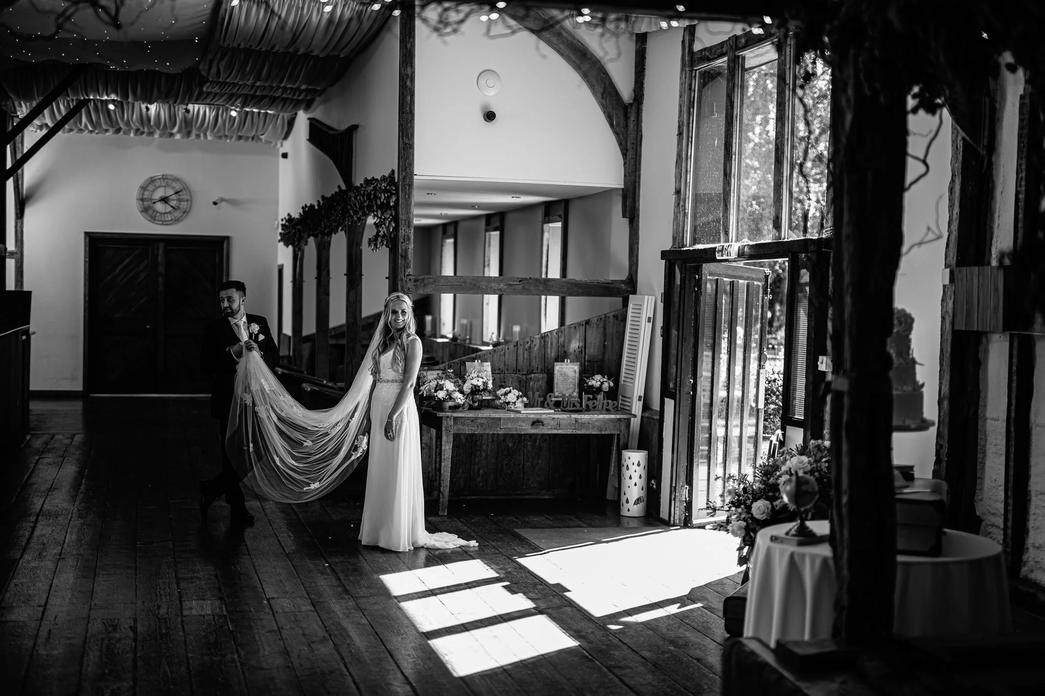  Groom holds the Bride’s veil 