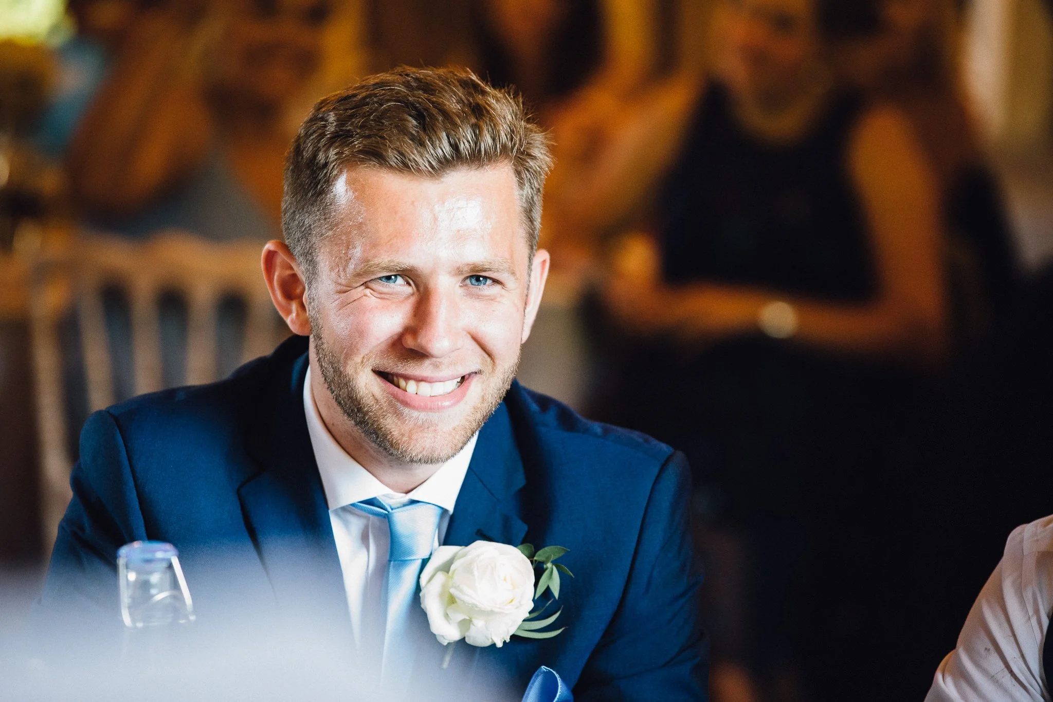  Wedding guest smiling 