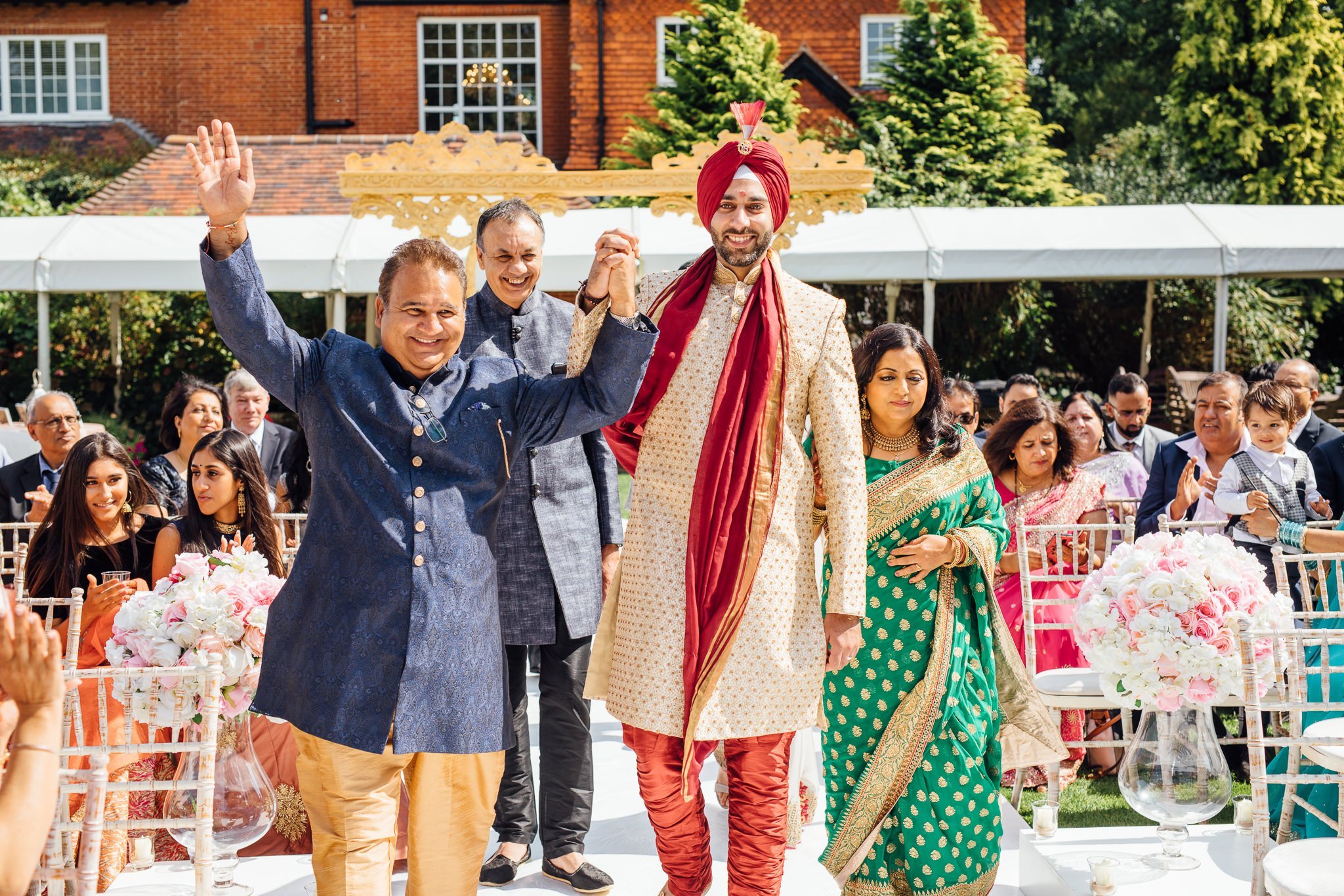  Father of the bride celebrates with groom 