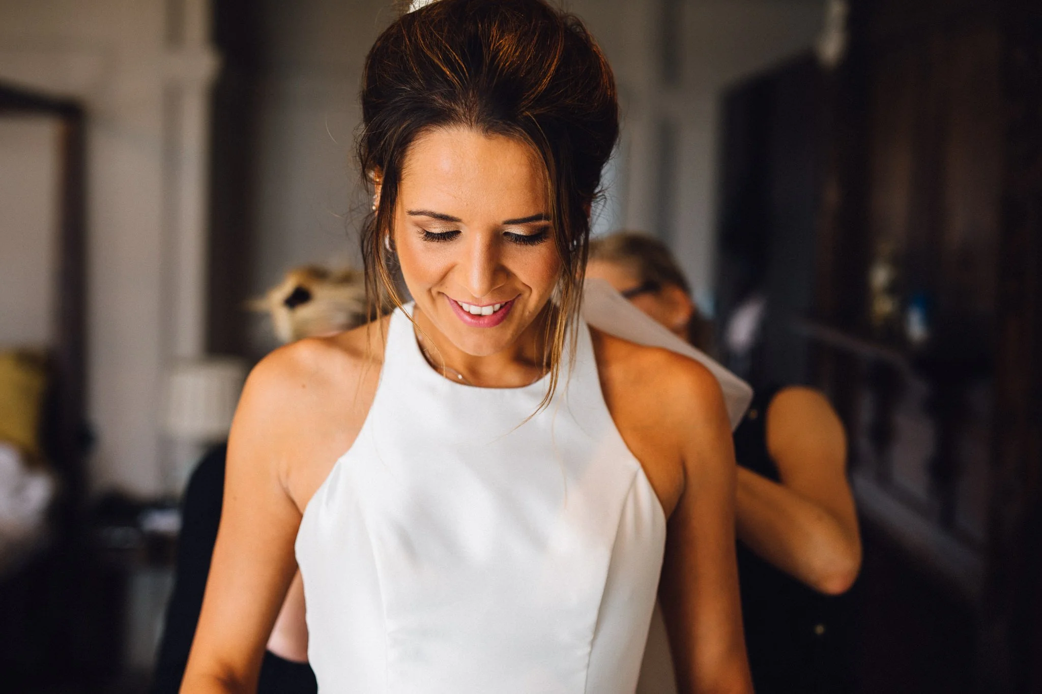  Bride during bridal preparation  at Laura Ashley The Manor Elstree 